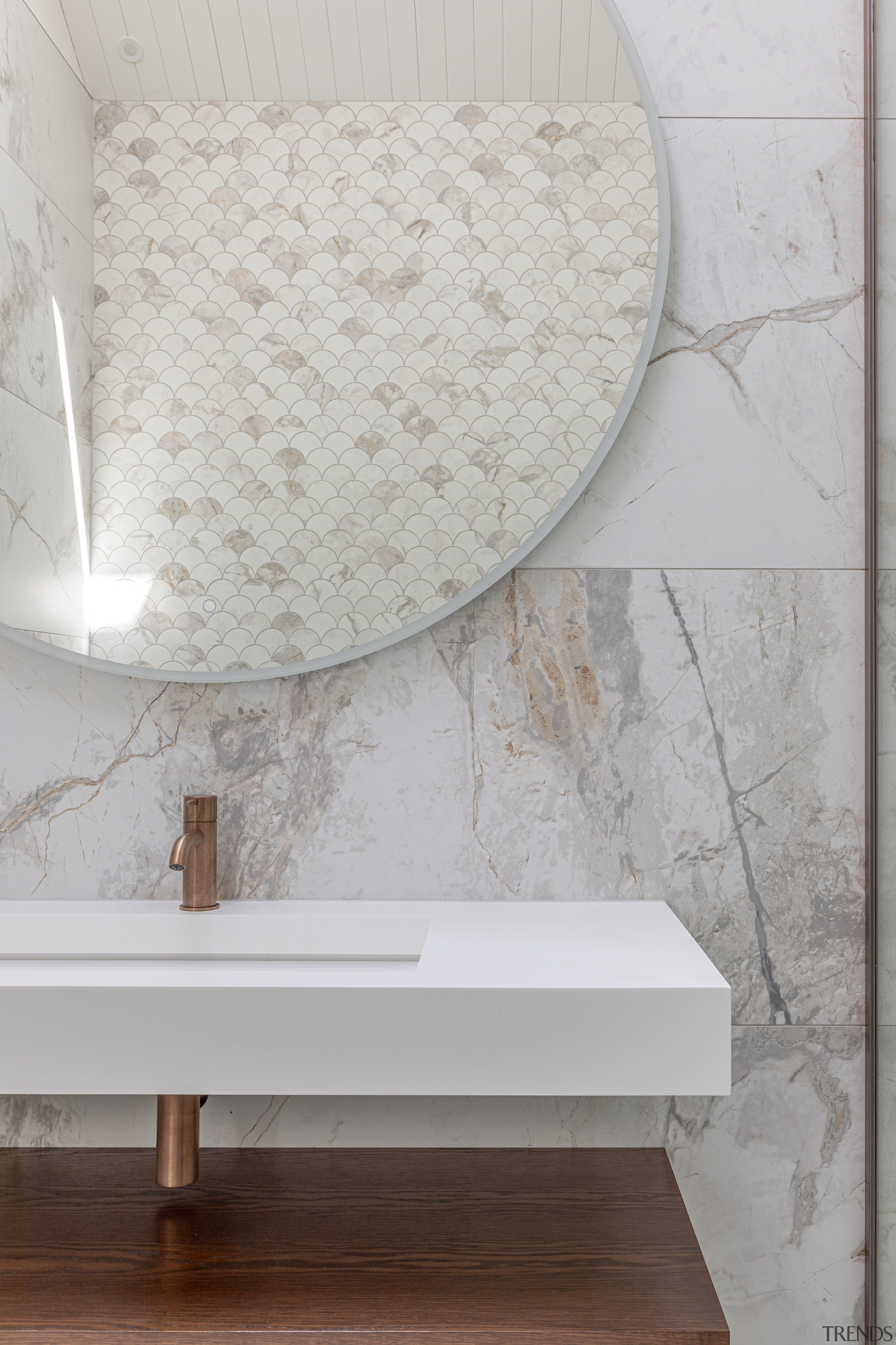 The large round vanity wall mirror adds to 
