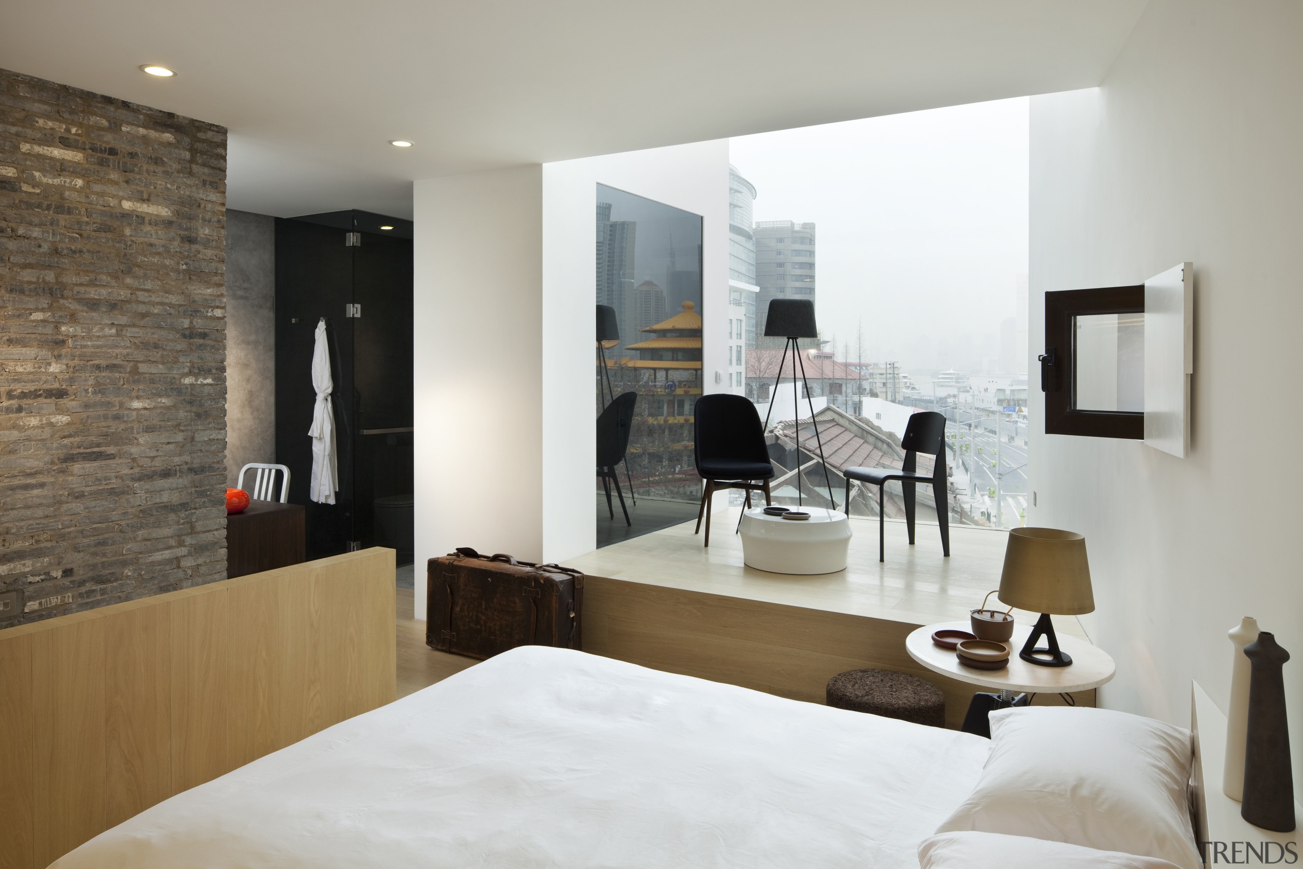 View of a contemporary boutique hotel in Shanghai. architecture, bed frame, bedroom, floor, furniture, interior design, living room, property, room, suite, wall, gray, white