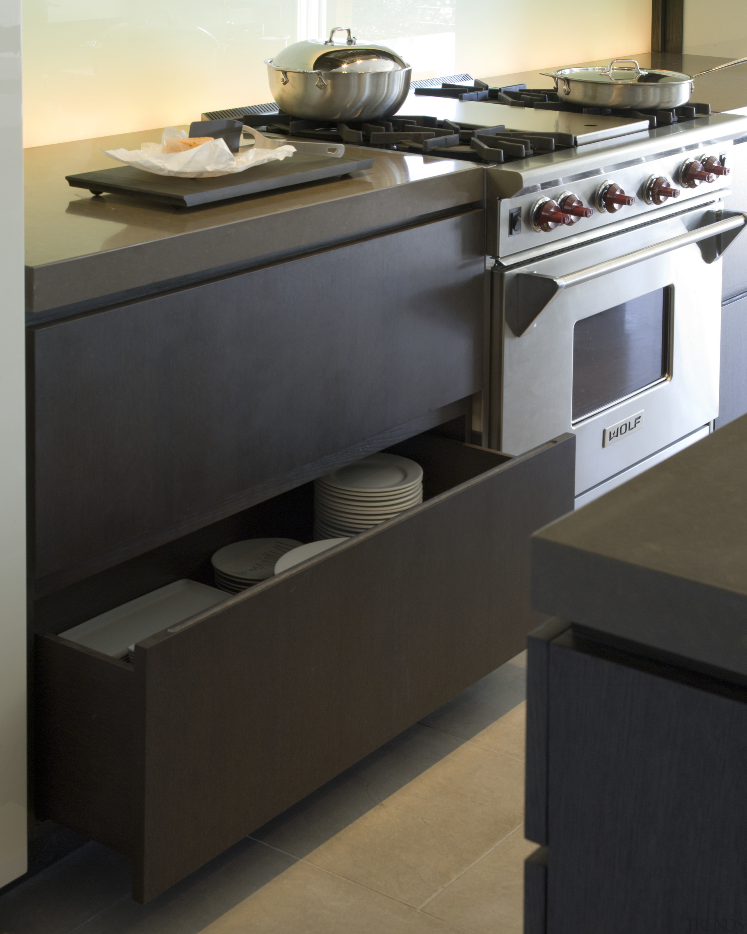 interior kitchen views of a renovated Victorian residence cabinetry, countertop, drawer, floor, flooring, furniture, gas stove, home appliance, kitchen, kitchen appliance, kitchen stove, major appliance, product design, black