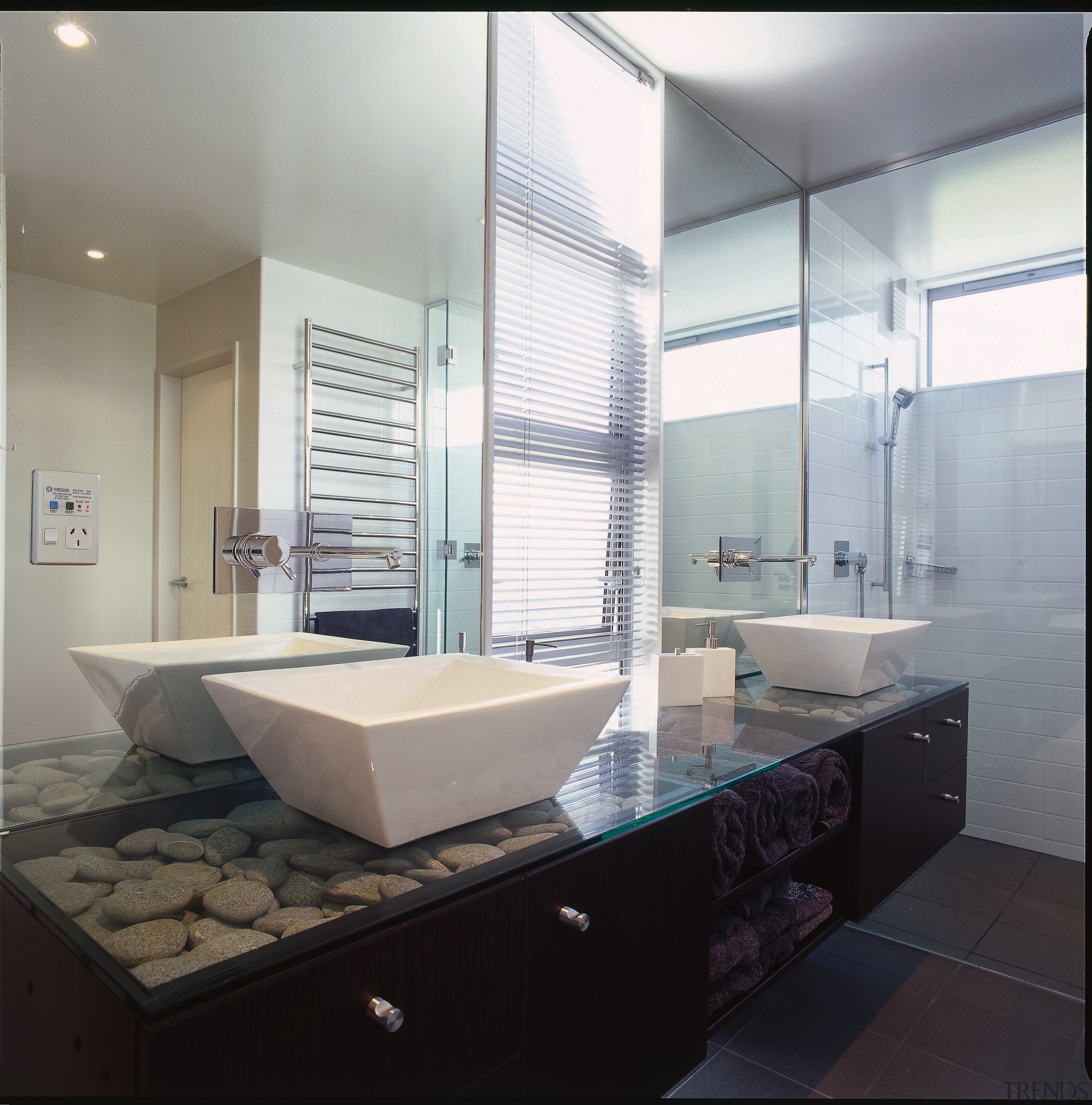 The view of a bathroom featuring twin basins architecture, bathroom, bathroom accessory, floor, glass, interior design, plumbing fixture, room, sink, window, gray, black