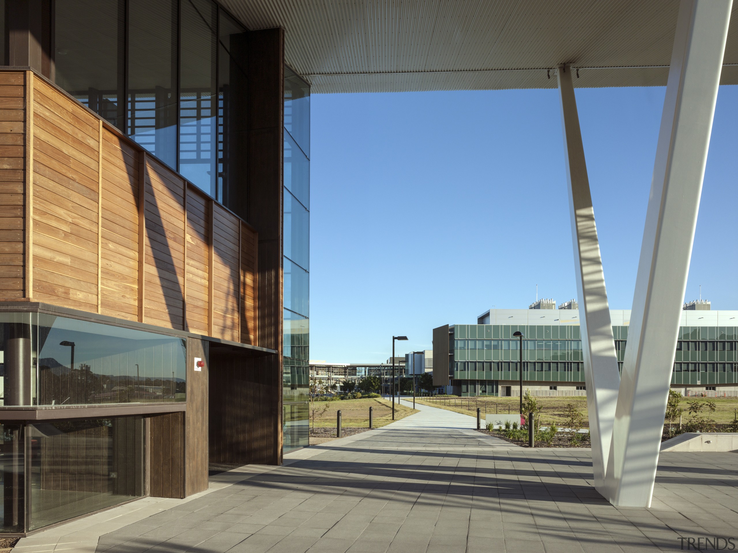 The Sustainable Buildings Research Centre sits on the apartment, architecture, building, condominium, corporate headquarters, facade, metropolitan area, mixed use, residential area, sky, structure, gray