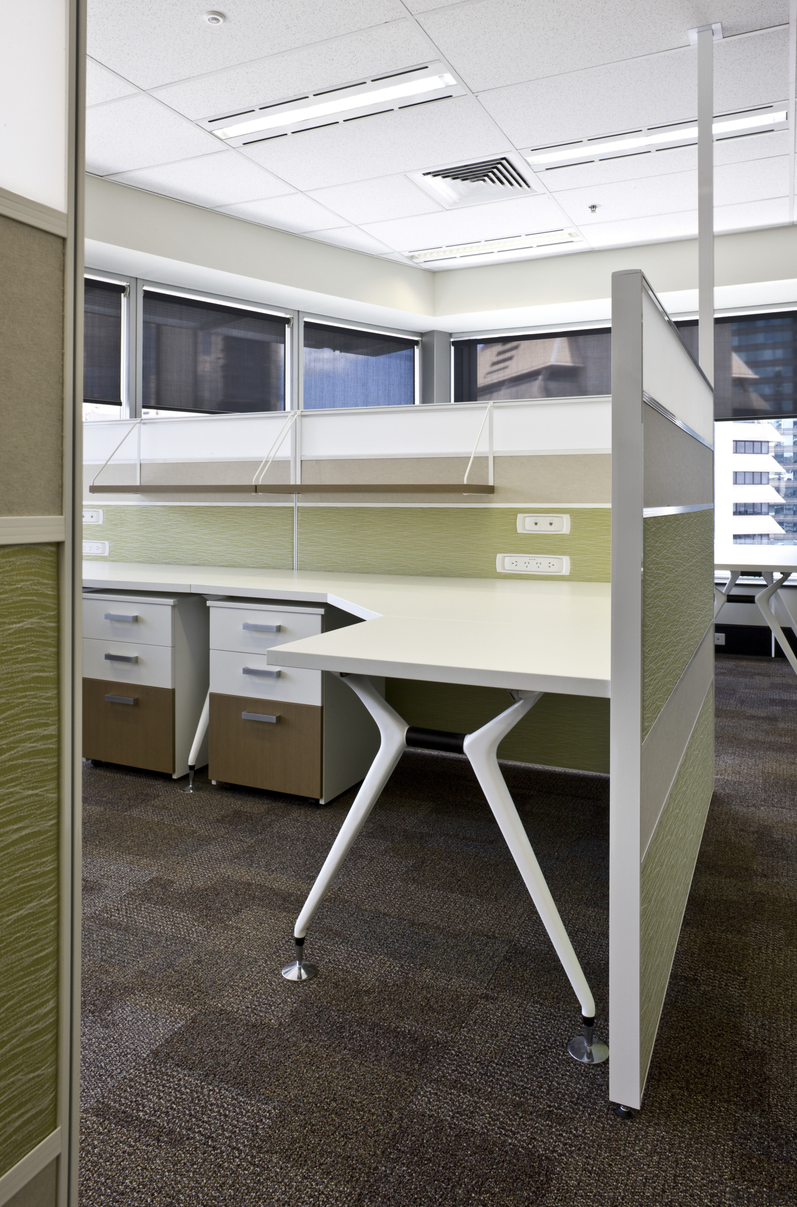 Interior view of an office which includes office desk, floor, furniture, office, product design, table, white