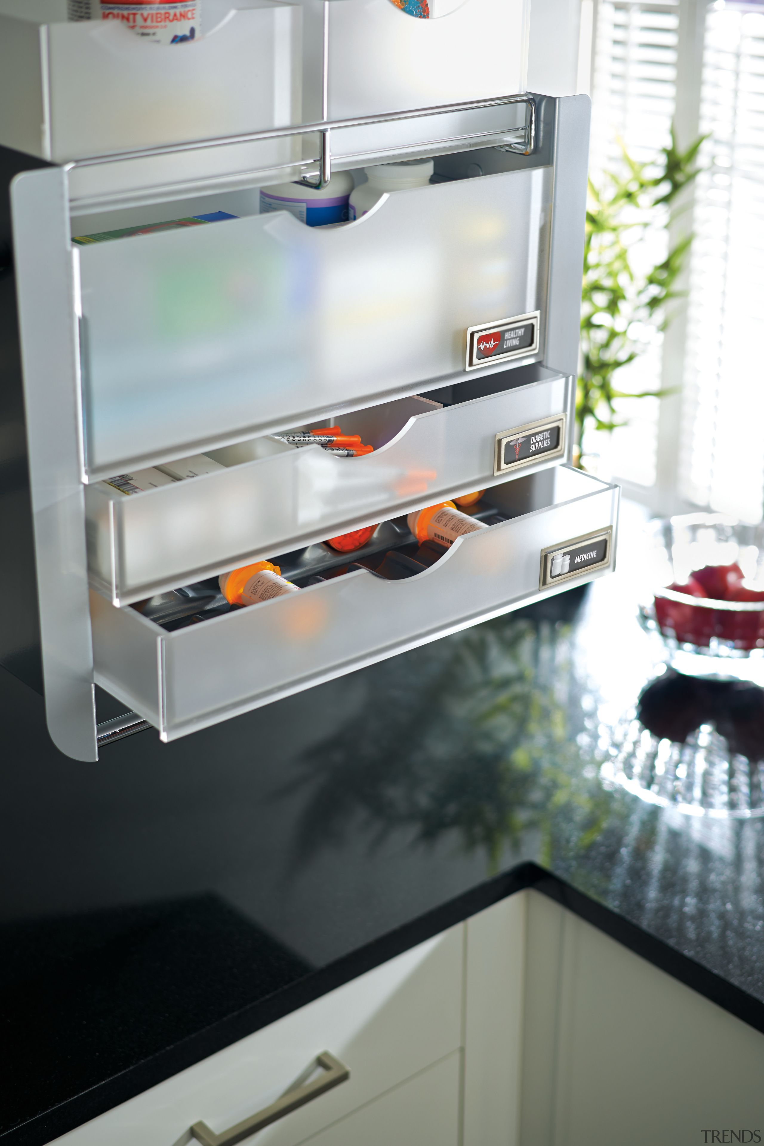 Rev-A-Shelf Universal Pull-Down kitchen storage system from Rev-A-Shelf countertop, home appliance, kitchen, kitchen appliance, kitchen stove, major appliance, refrigerator, small appliance, gray