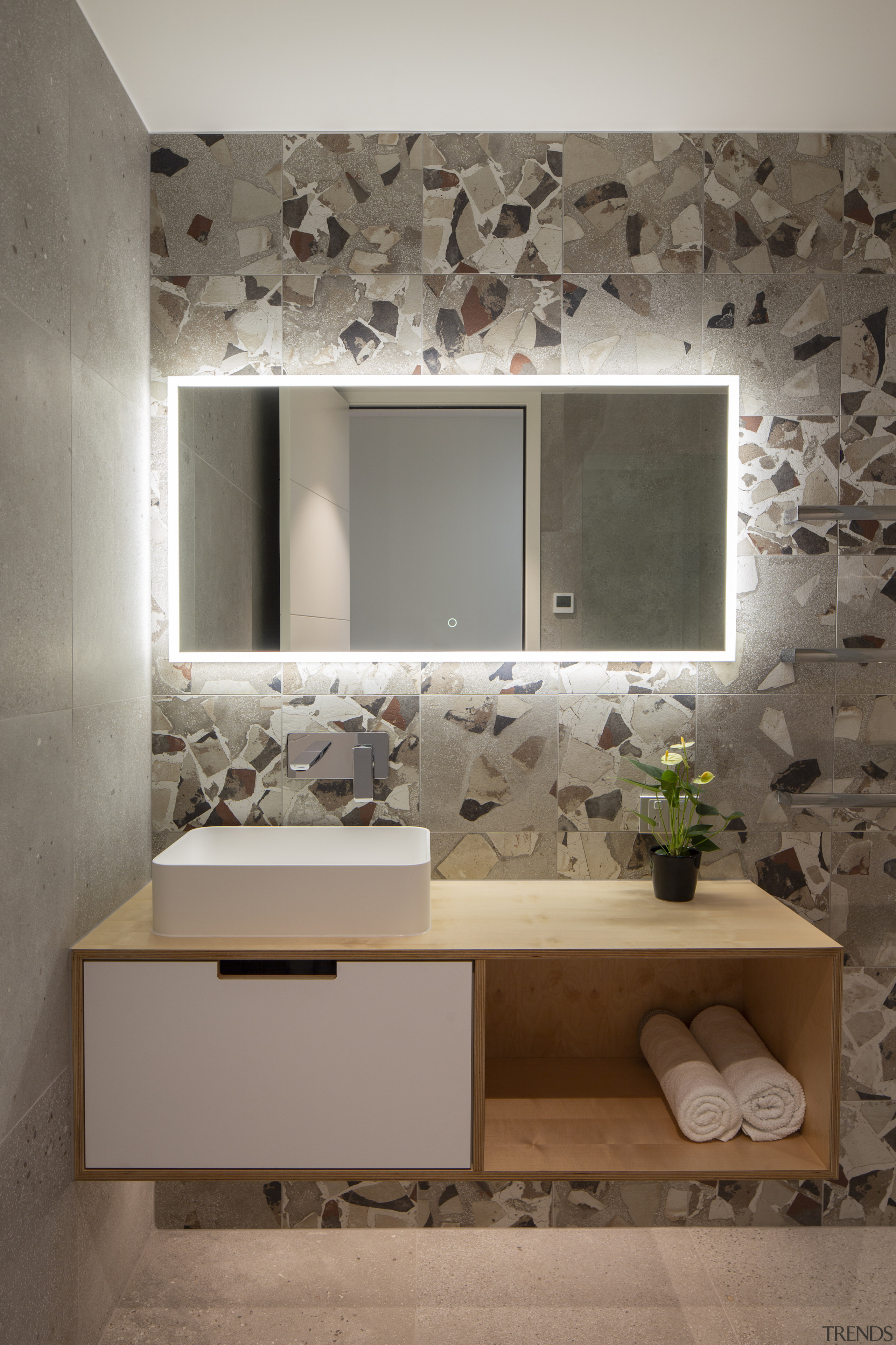 Cantilevering the vanity adds to the bathroom's sense 