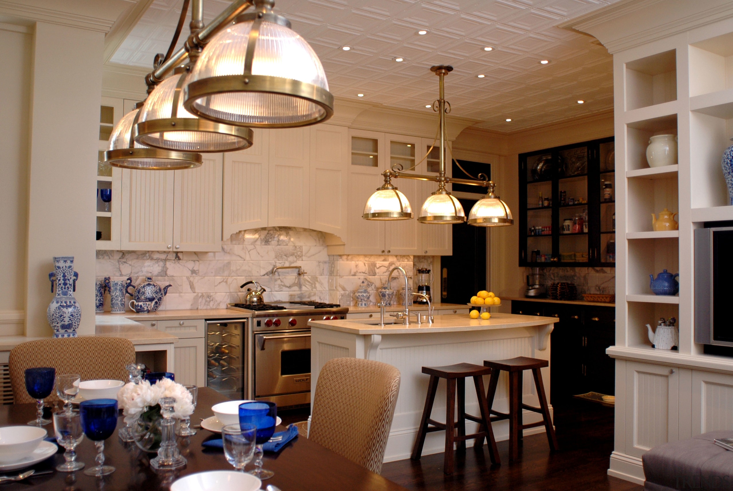 view of kitchen with dining area in foreground, ceiling, countertop, dining room, home, interior design, kitchen, room, brown, gray
