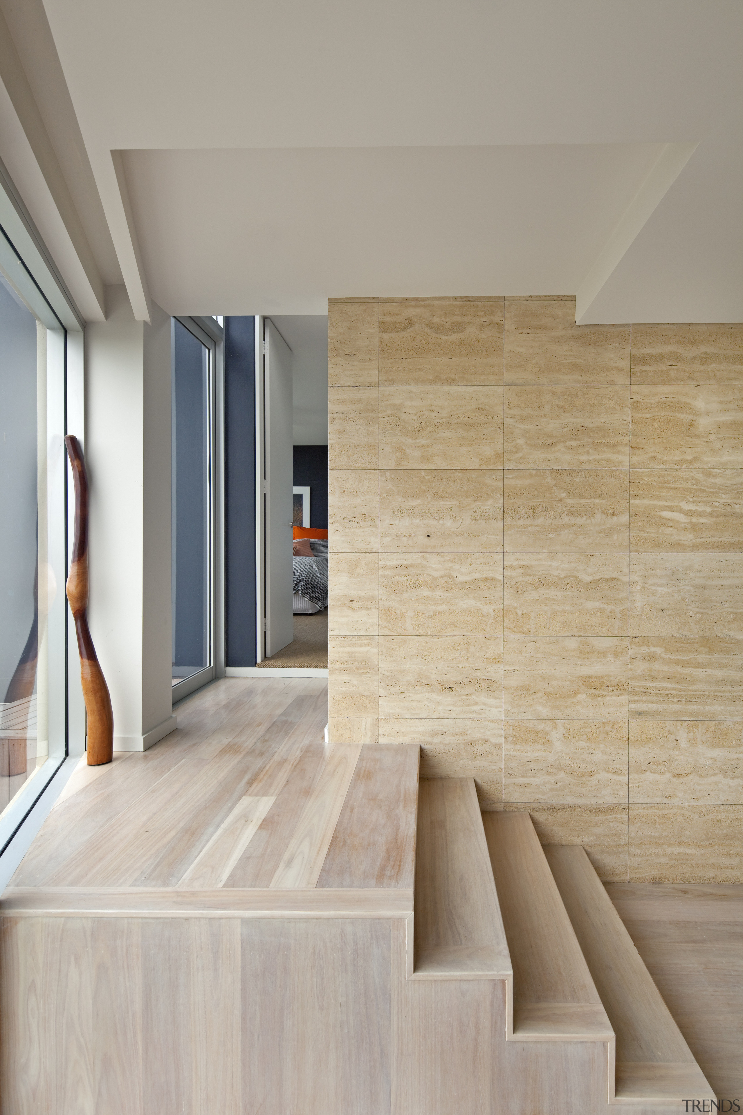 This house was designed by Andy MacDonald with angle, architecture, daylighting, floor, flooring, hardwood, house, interior design, laminate flooring, loft, plywood, product design, stairs, wall, wood, wood flooring, gray