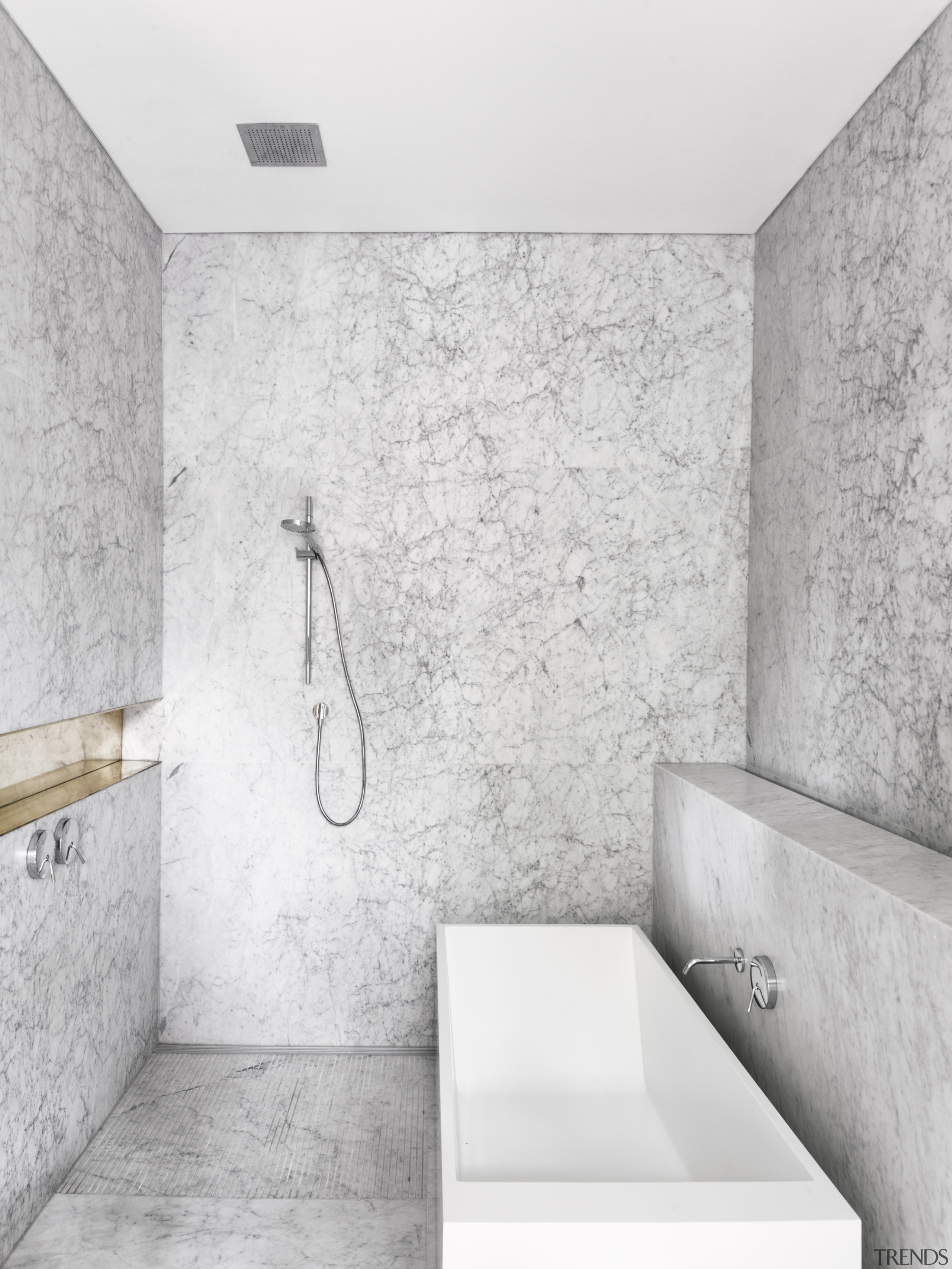 This family bathroom’s clean-lined aesthetic also makes it angle, architecture, bathroom, black and white, floor, interior design, plumbing fixture, room, tap, tile, wall, white