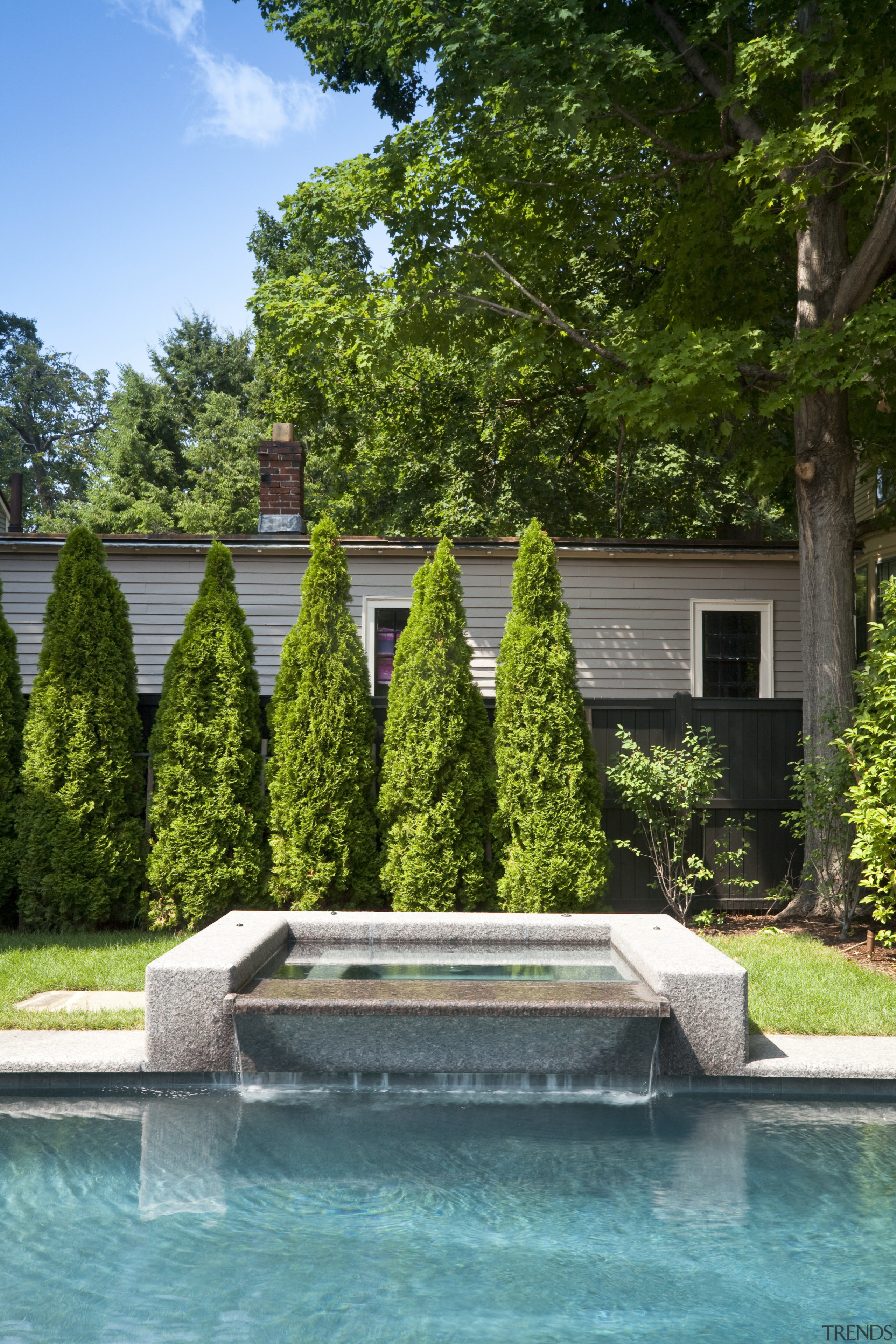 View of outdoor pool area with water feature estate, home, house, landscape, landscaping, nature, outdoor structure, plant, property, real estate, reflection, swimming pool, tree, water, water feature, brown, teal