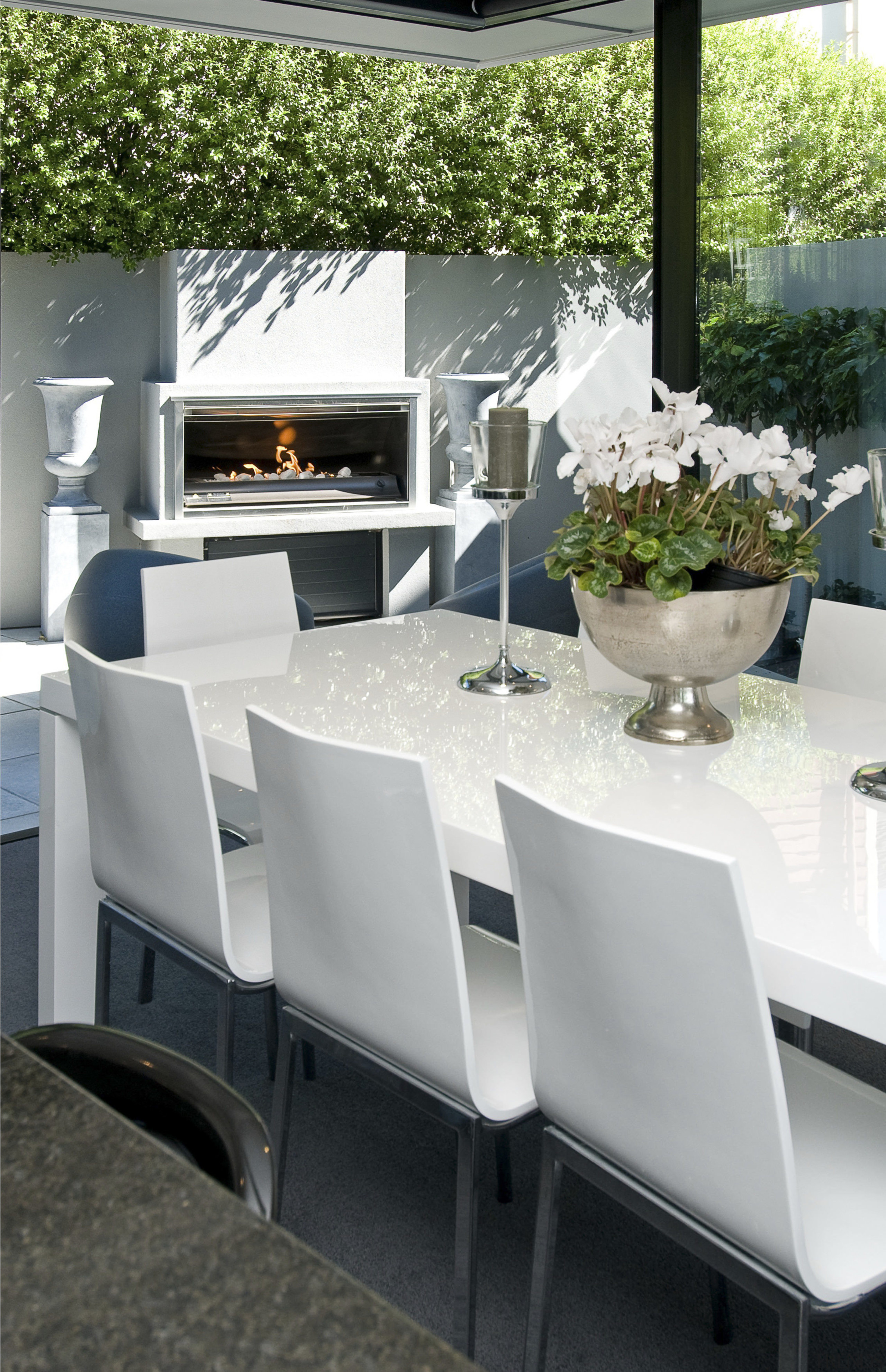 The Moorings in Taupo by Haimes Building fireplace chair, dining room, furniture, interior design, table, gray