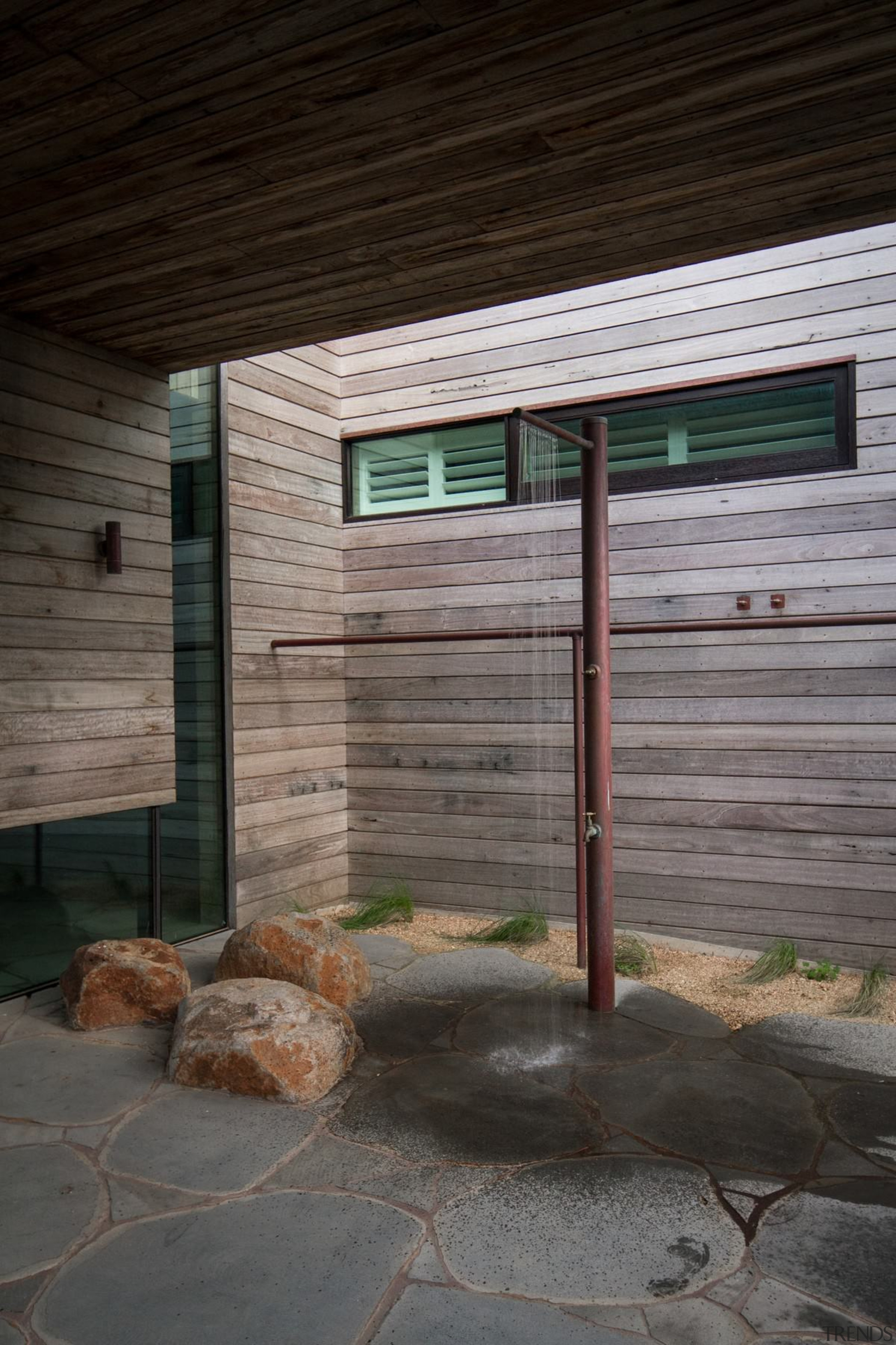 This outdoor shower is a beach necessity - architecture, home, house, siding, wall, wood, black, gray