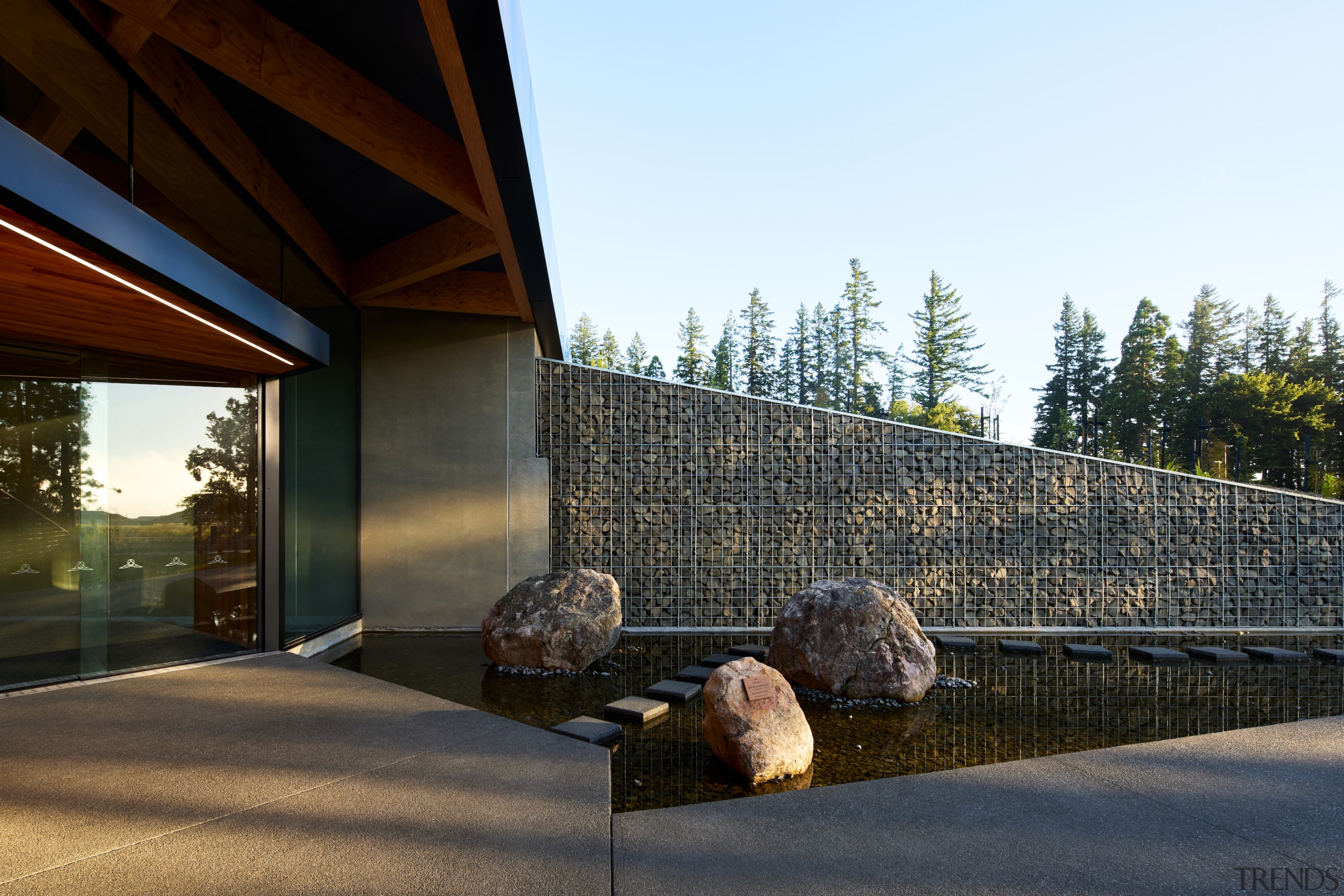 Gabion walls and acid etched precast concrete lead 