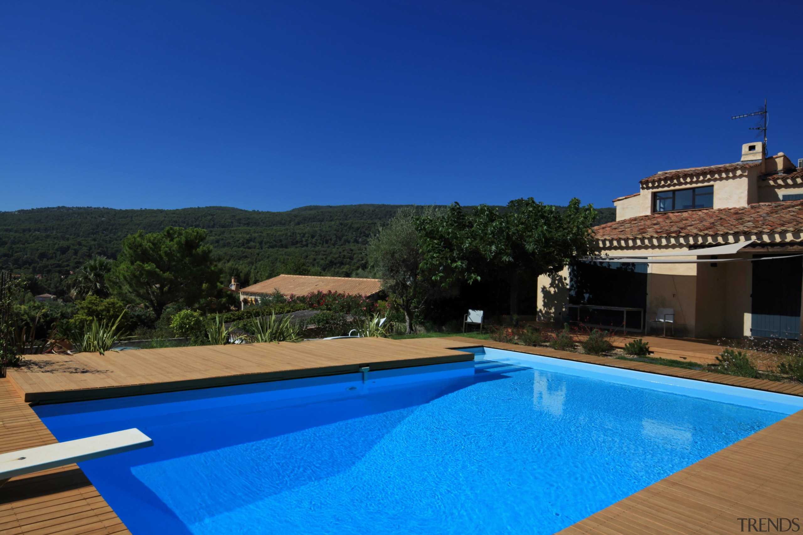 Outdoor living products made of radiata pine from estate, home, house, leisure, property, real estate, resort, roof, sky, swimming pool, villa, water, blue