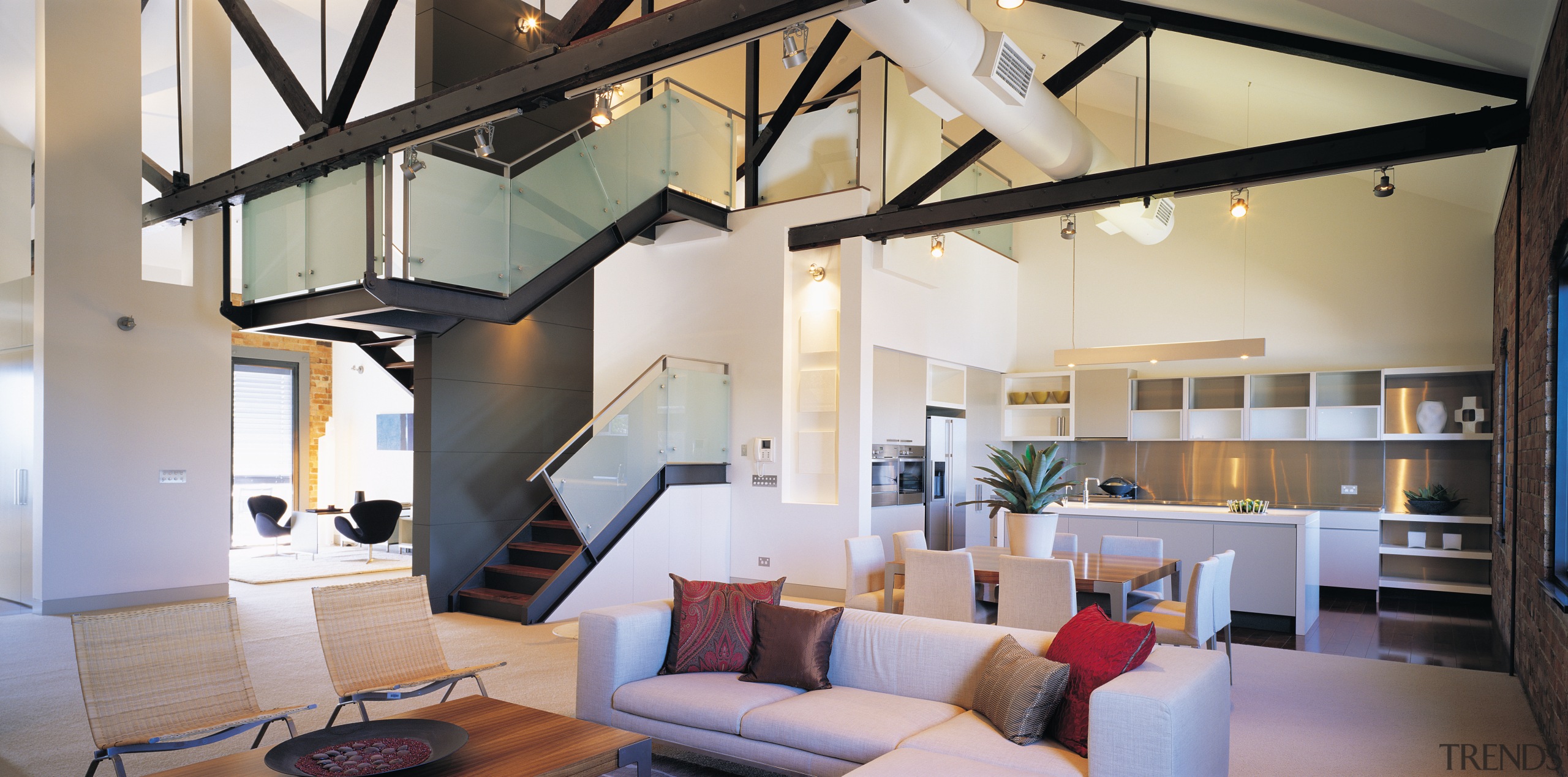 A view of a living area, cream carpet, ceiling, home, interior design, living room, loft, gray