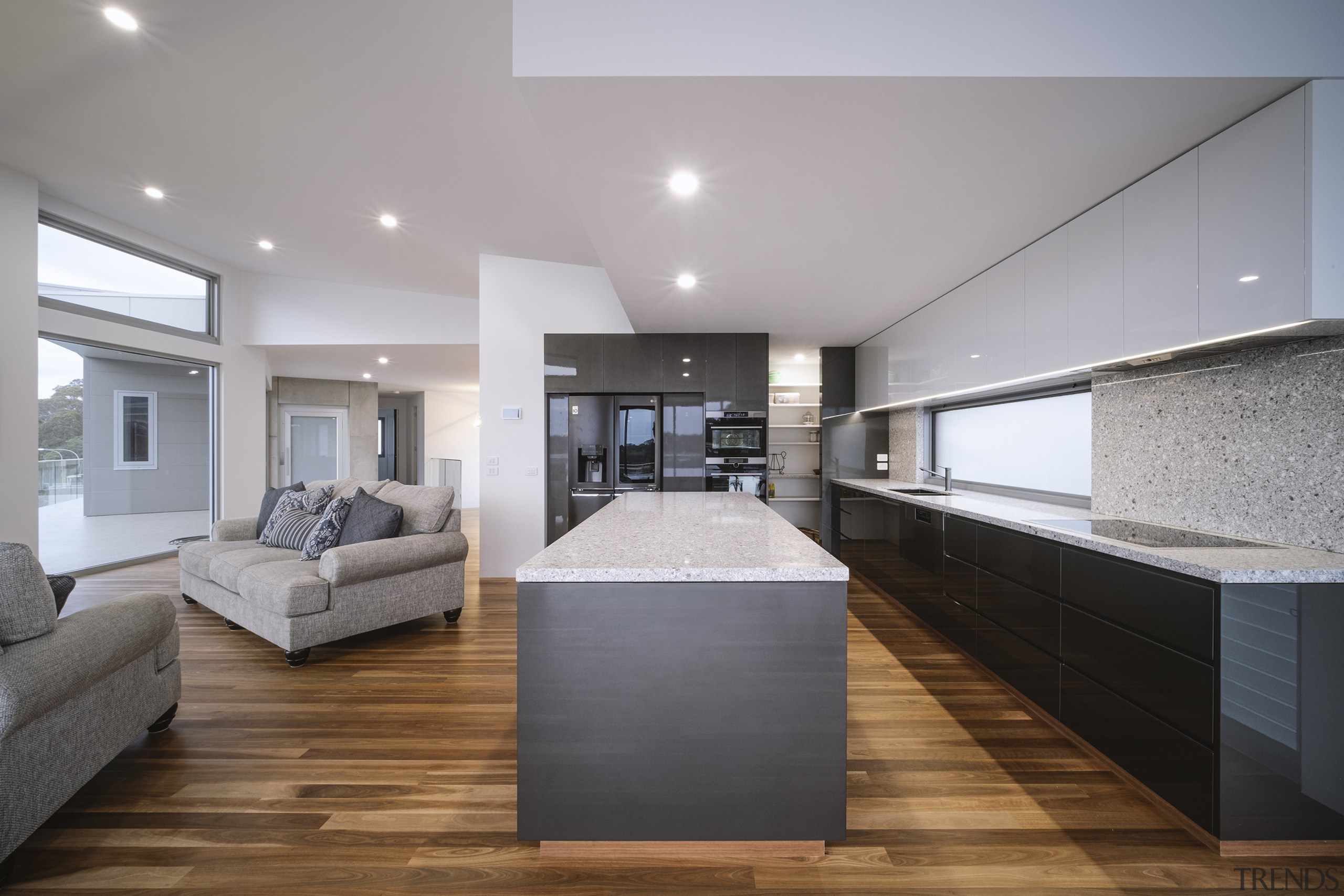 Either side of the kitchen are sitting areas 