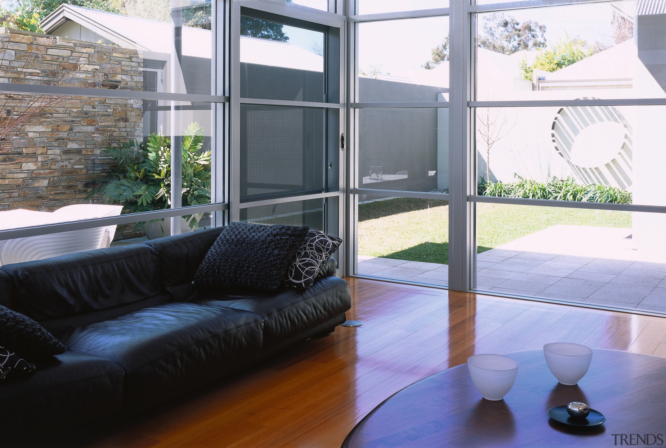 Interior view of the living area as well architecture, balcony, daylighting, floor, home, house, interior design, living room, property, real estate, window