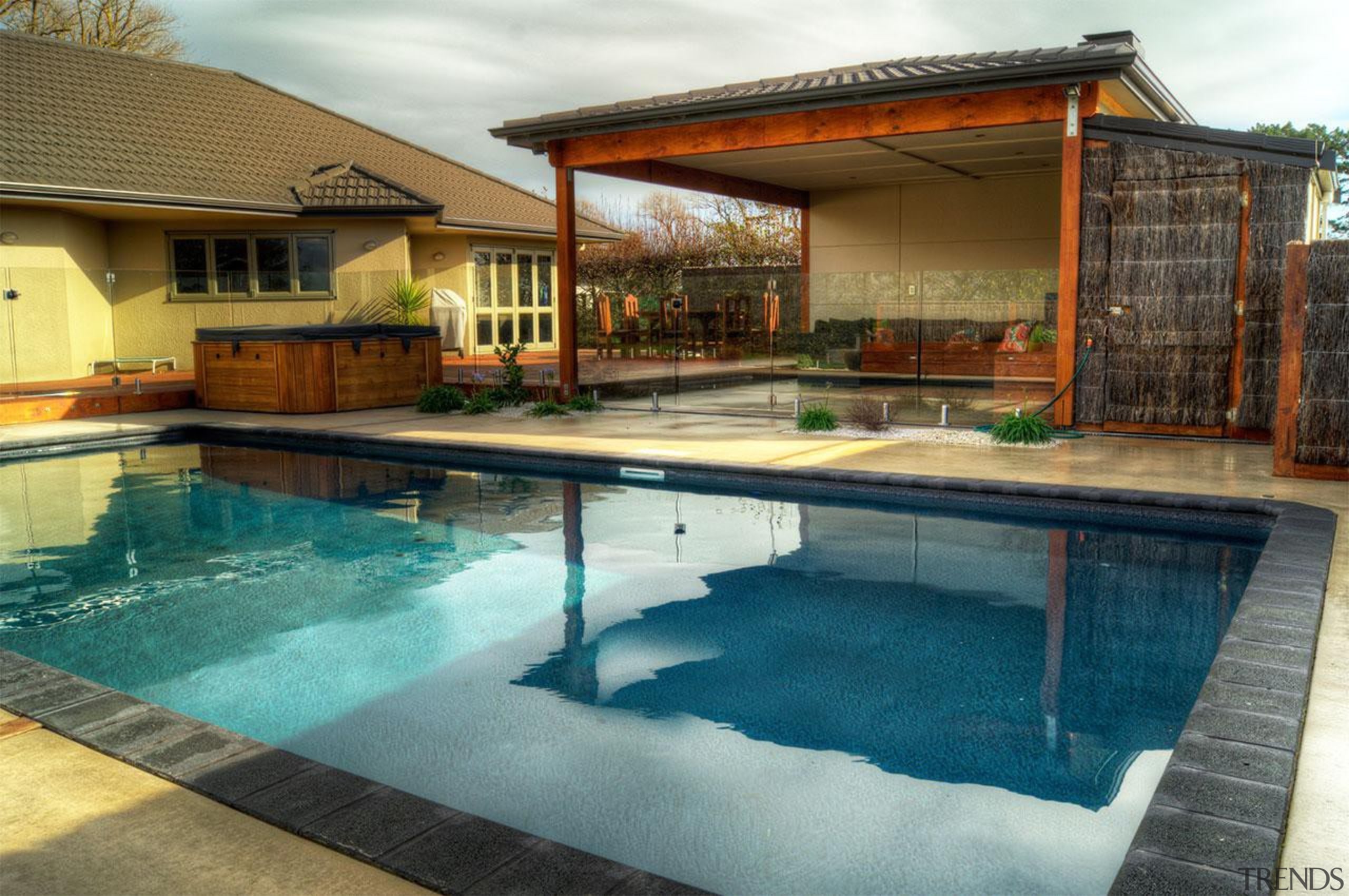 Gold Award recipient for Residential Swimming Pools under backyard, estate, home, house, leisure, property, real estate, resort, swimming pool, villa, water, brown