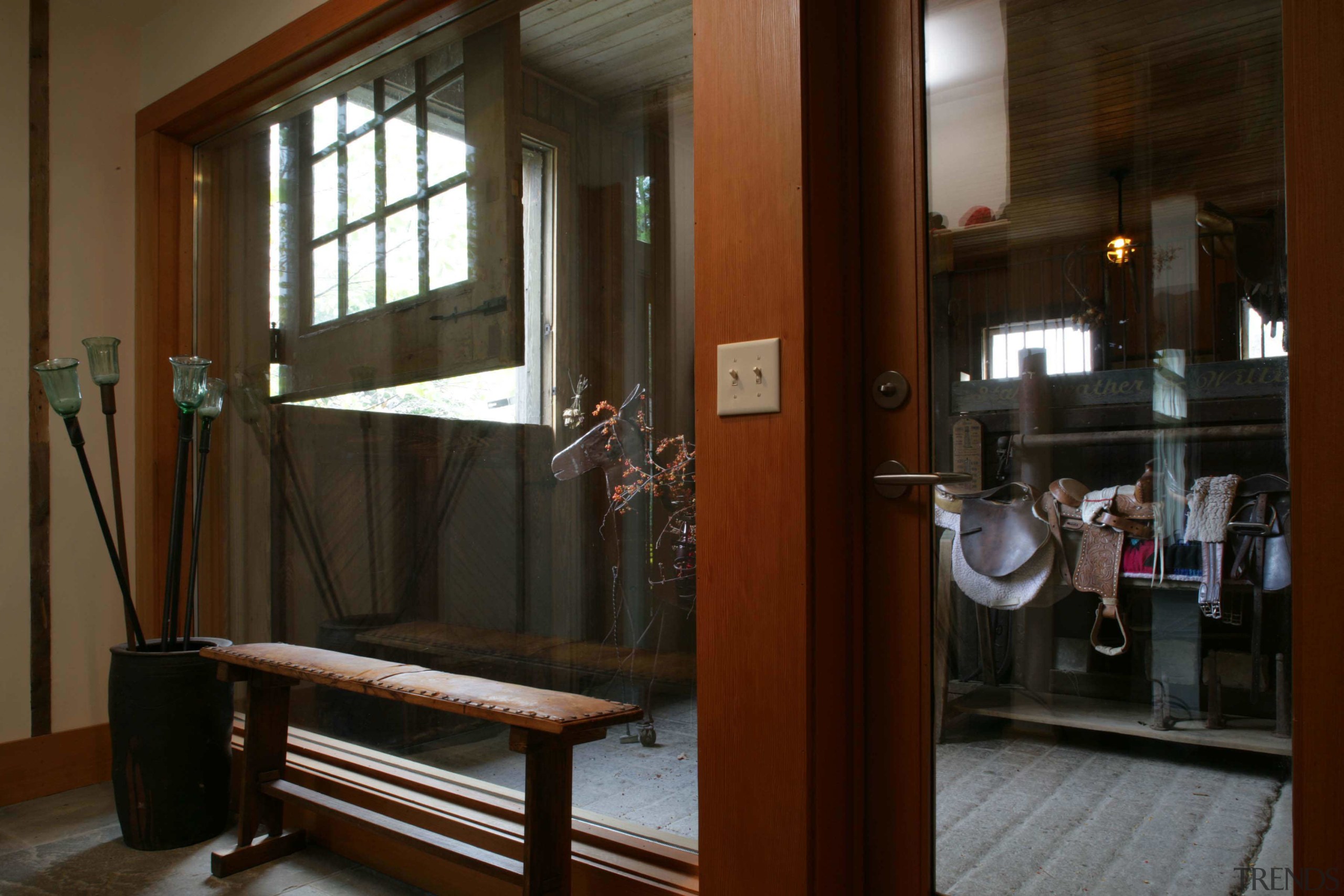 A view of the inside of the old door, furniture, interior design, lobby, window, black, brown