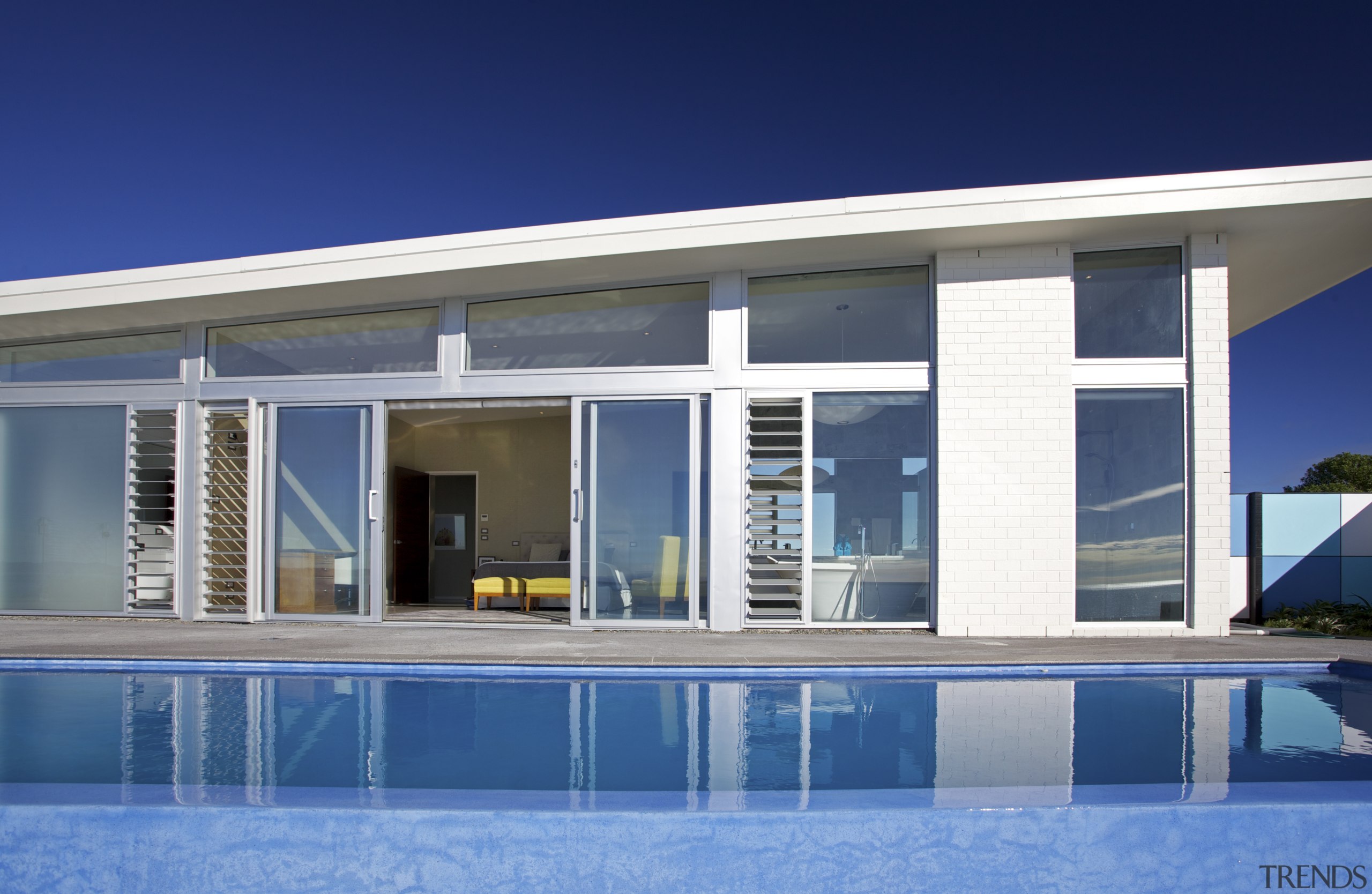 ​​​​​​​Virtually all the rooms in this contemporary cliff-top architecture, building, design, facade, glass, home, house, interior design, leisure, property, real estate, swimming pool, villa, window, blue