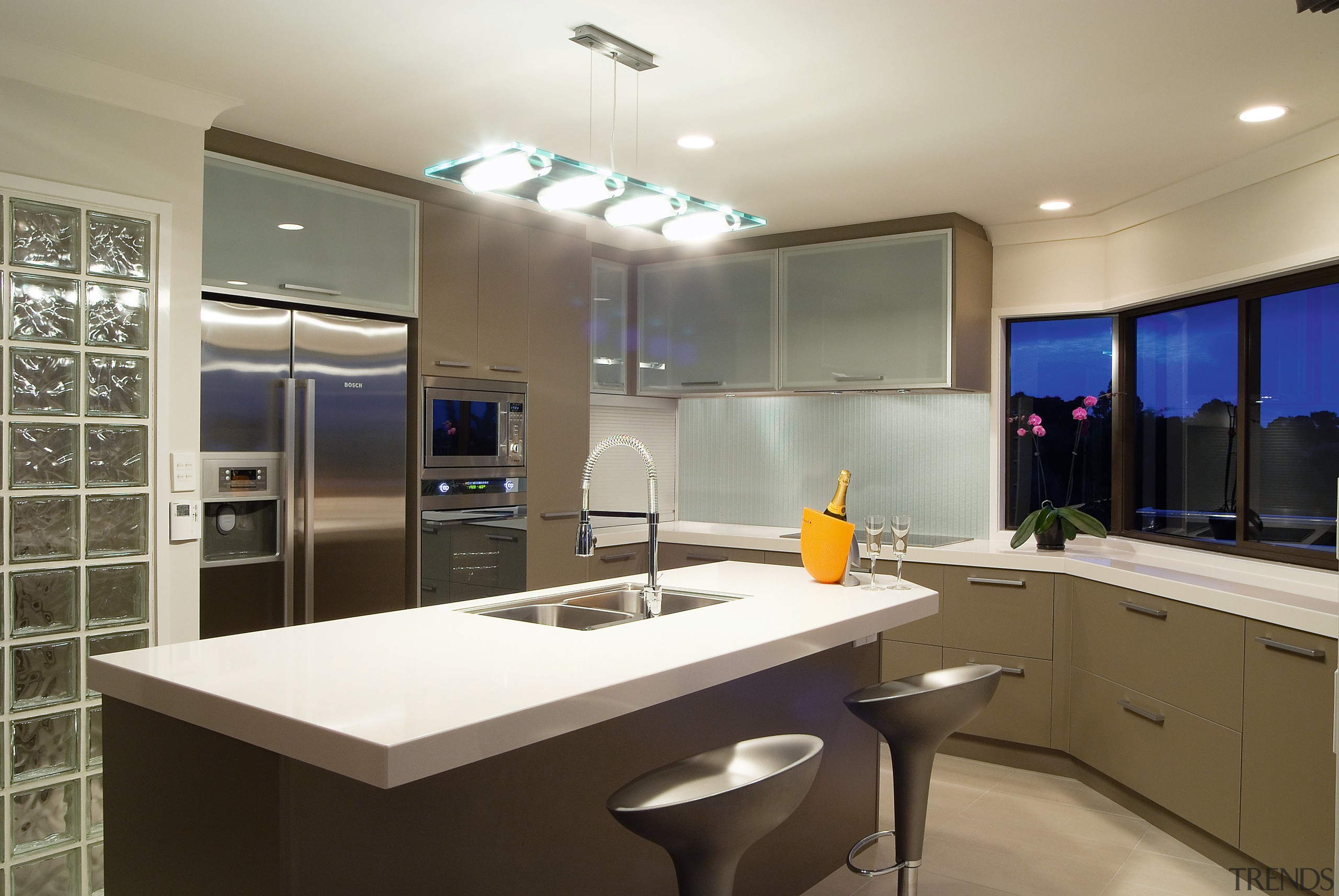 A view of this modern contemporary designed kitchens cabinetry, countertop, interior design, kitchen, real estate, room, gray