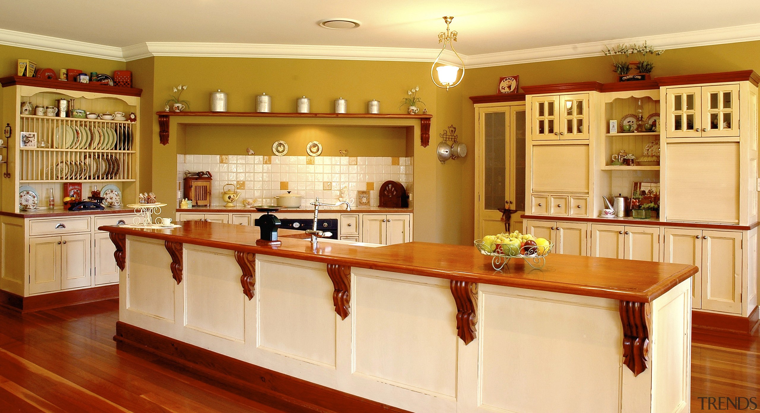 View of kitchen with long wooden island and cabinetry, countertop, cuisine classique, interior design, kitchen, real estate, room, orange