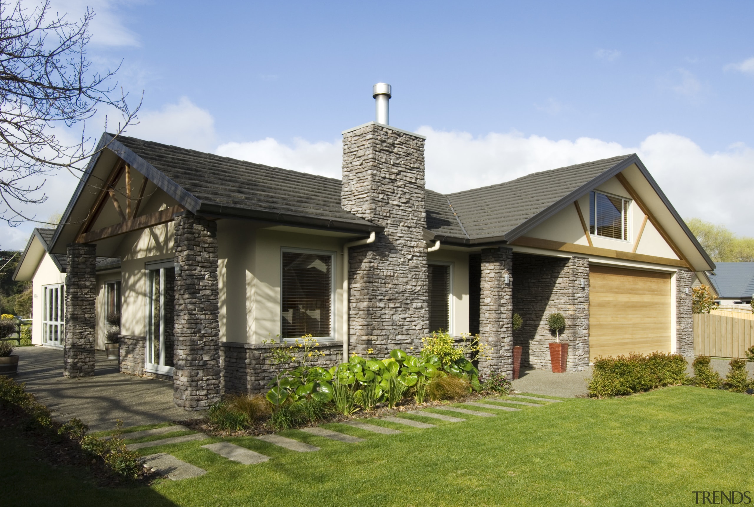 A view of some stone cladding from Stutex building, cottage, elevation, estate, facade, farmhouse, historic house, home, house, landscape, property, real estate, residential area, roof, siding, suburb