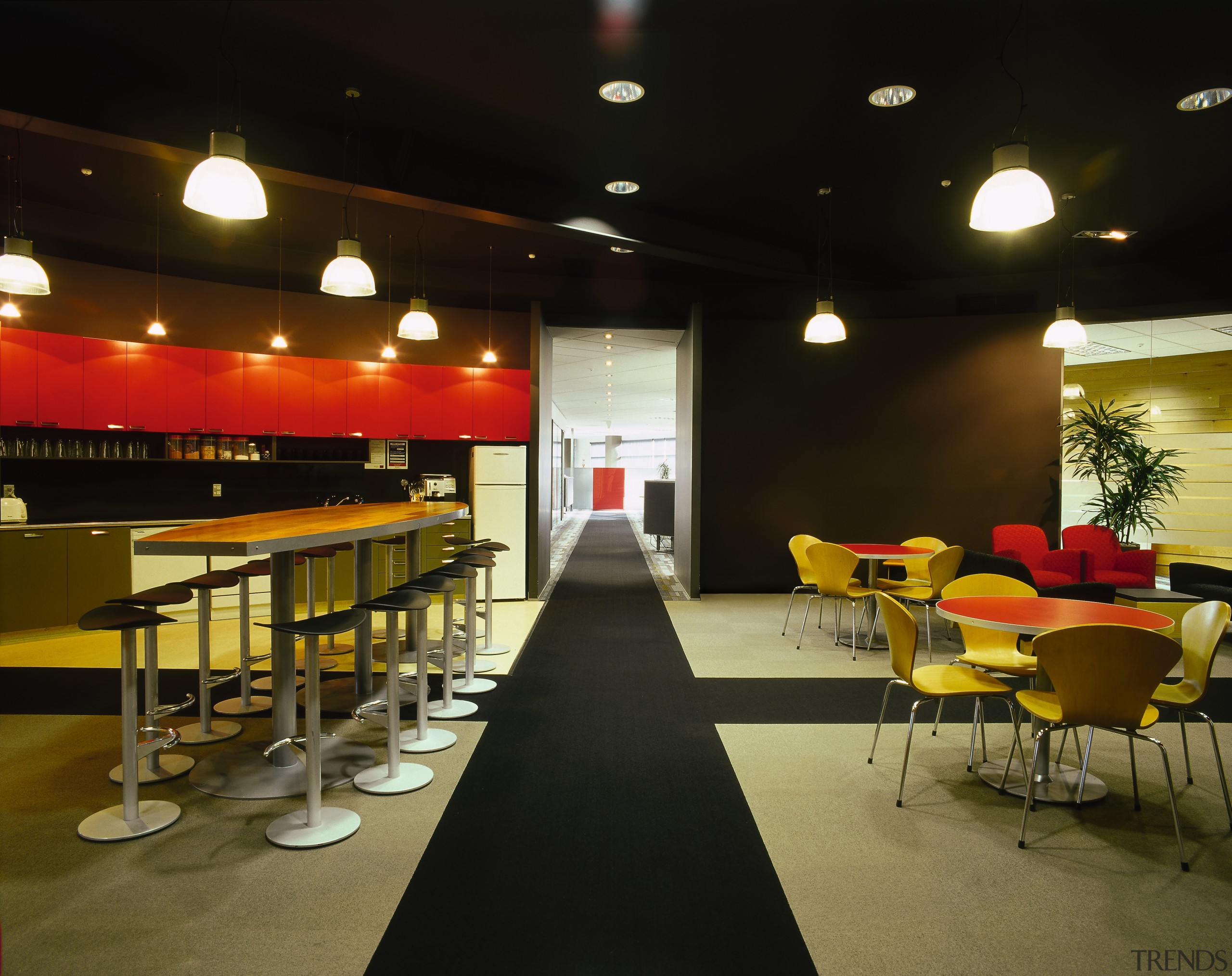View of the kitchen, black and white floor, function hall, interior design, lighting, restaurant, table, black, brown