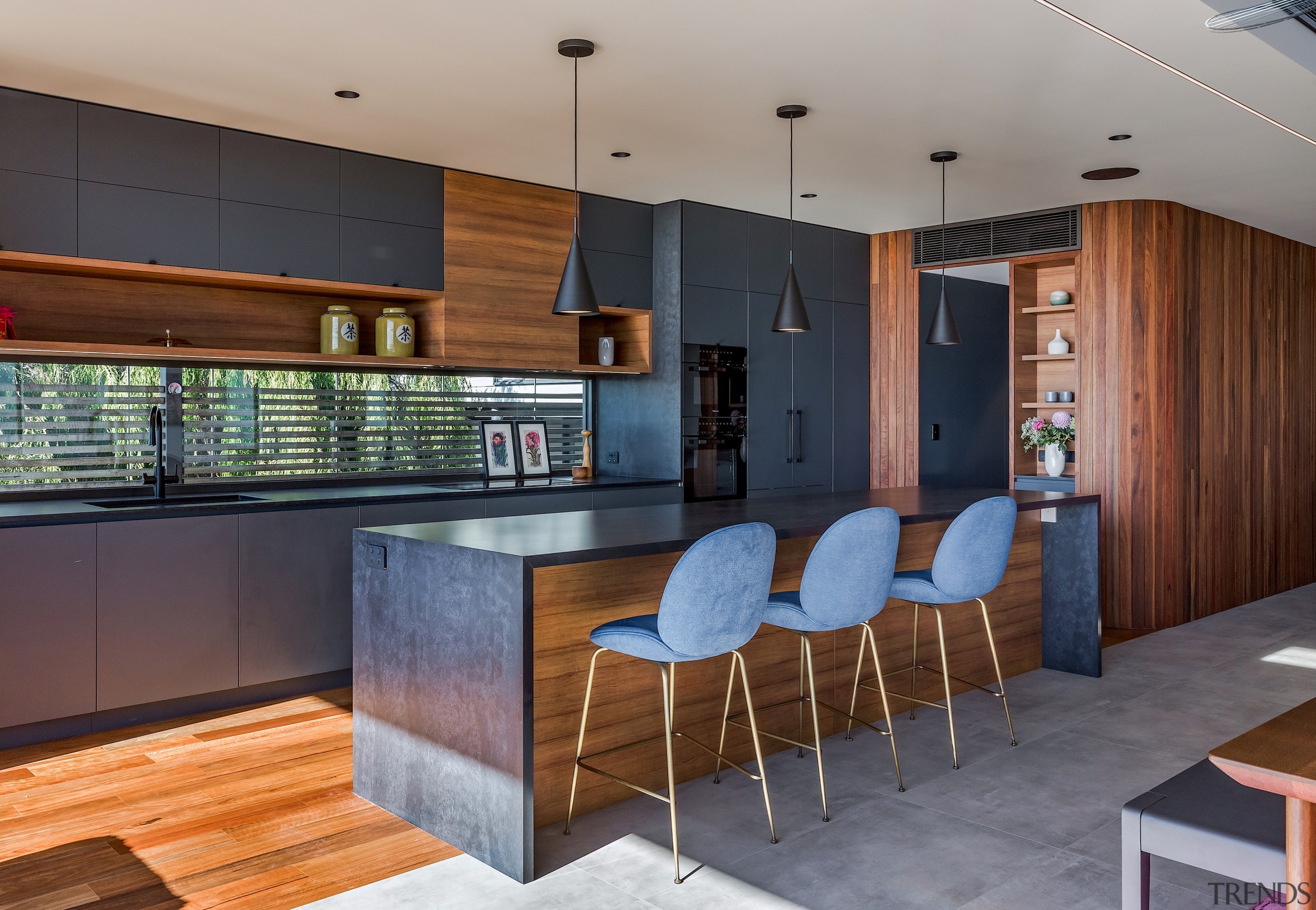 A window splashback floods natural light onto work 