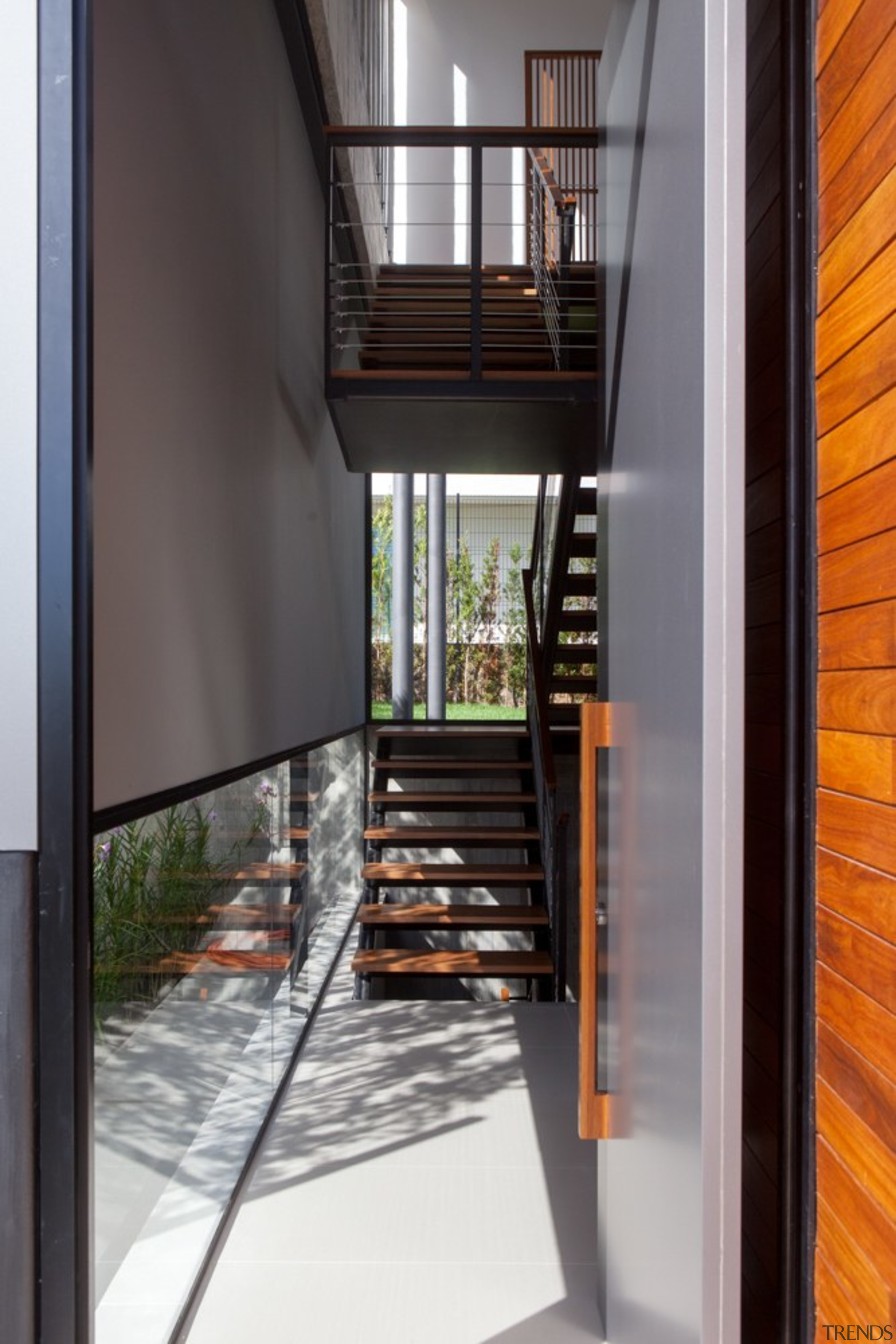 A low-slung window adds for an interesting touch architecture, daylighting, door, home, house, interior design, real estate, stairs, window, black, gray