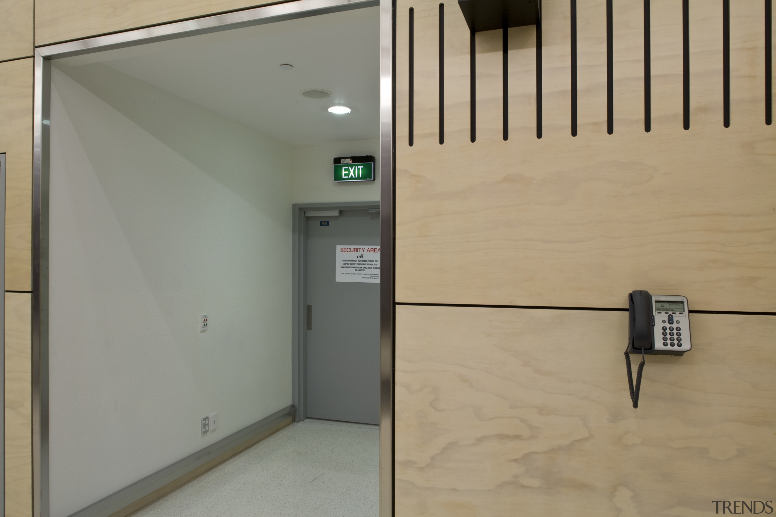 View of Auckland Airport's new international terminal where door, floor, glass, orange, gray