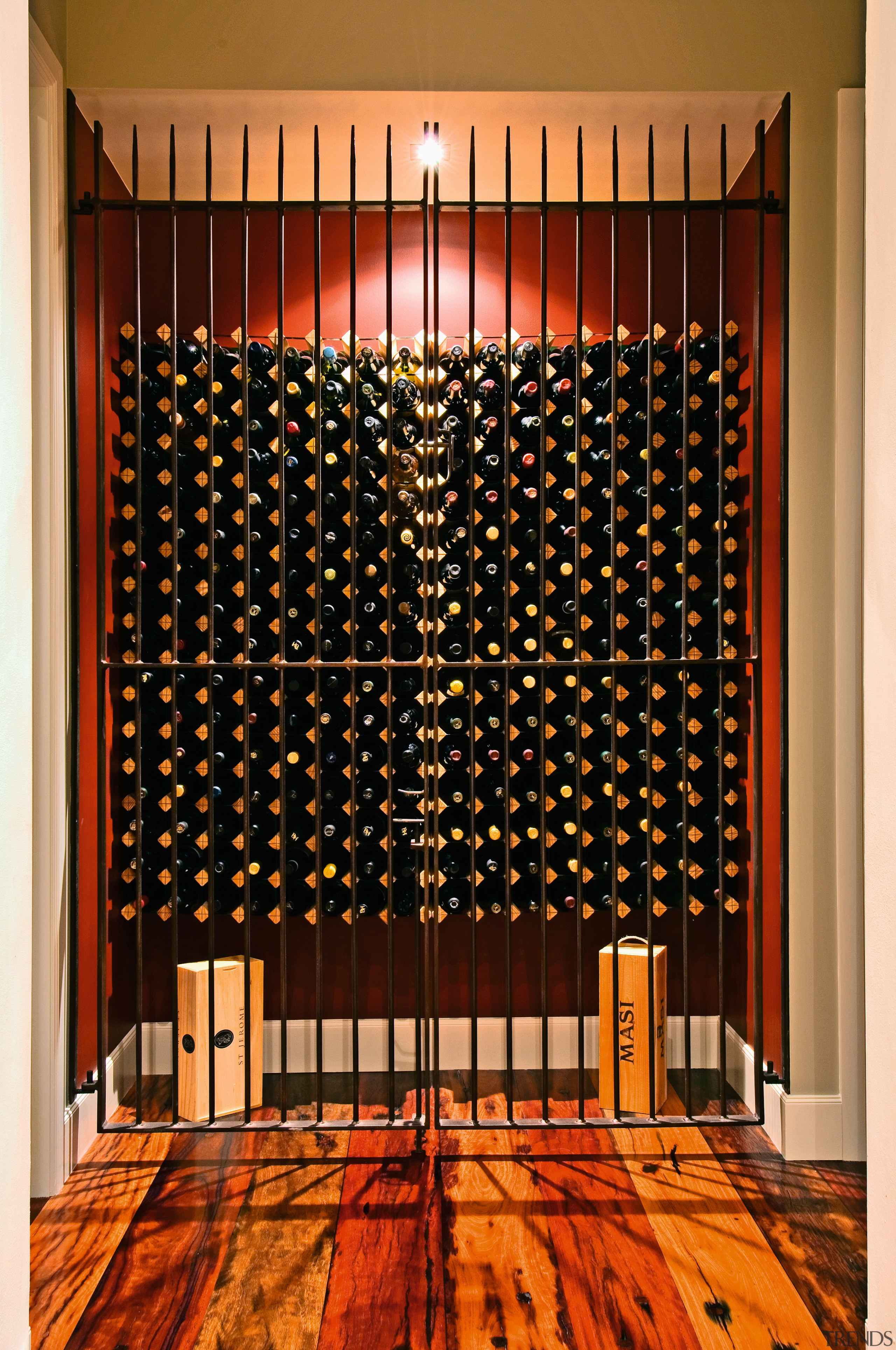view of the decorative wine cellar  featuring curtain, flooring, interior design, lighting, textile, wall, window, window blind, window covering, window treatment, wood, red