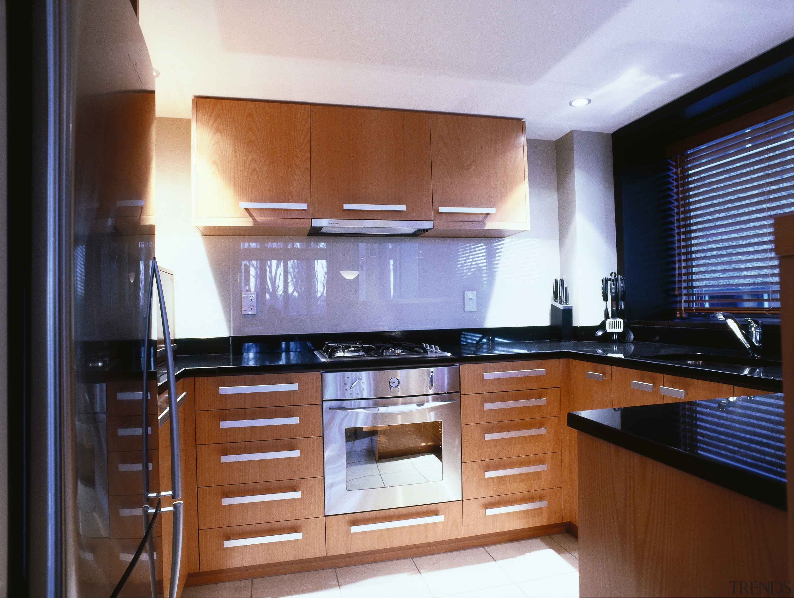 View of the kitchen, wood cabinetry, long stainless cabinetry, countertop, interior design, kitchen, property, room, brown