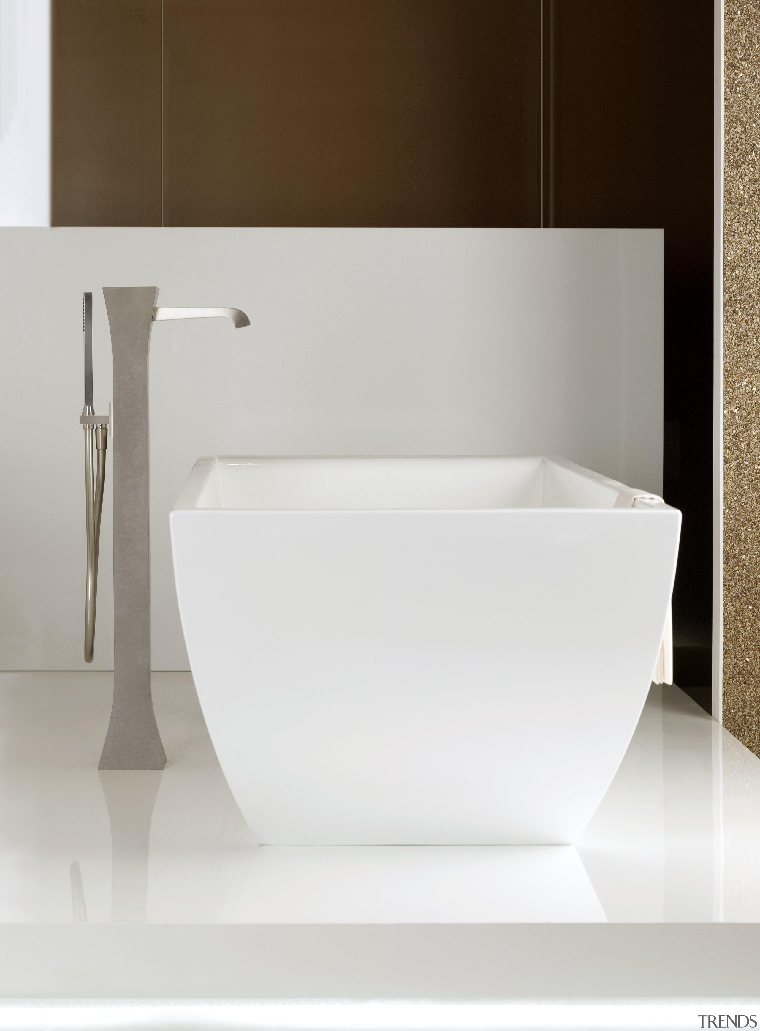 The Mimi floor-mount tub filler makes a vivid angle, bathroom, bathroom sink, bidet, ceramic, plumbing fixture, product design, sink, tap, toilet seat, white