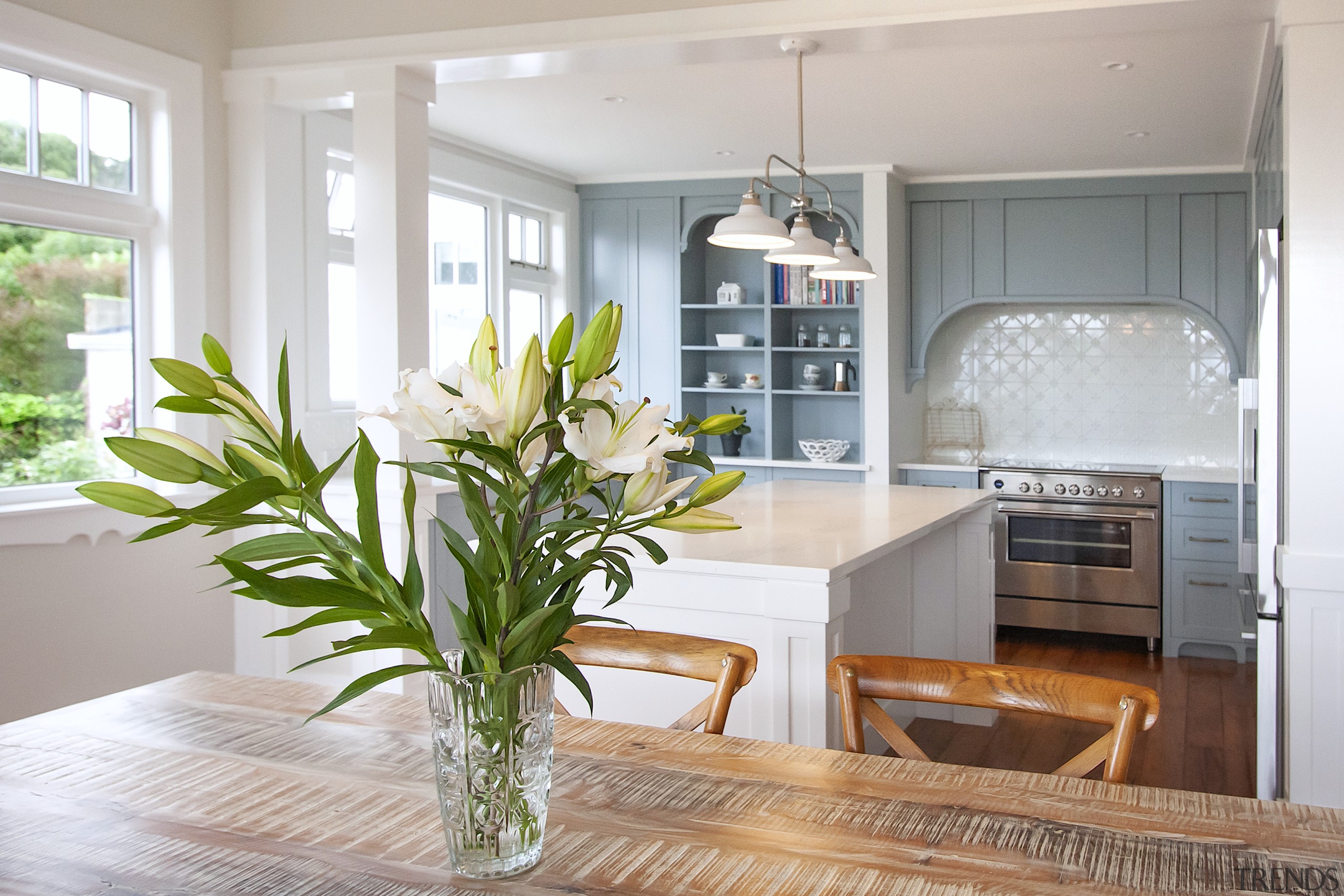 The wood dining setting connects with the timber 