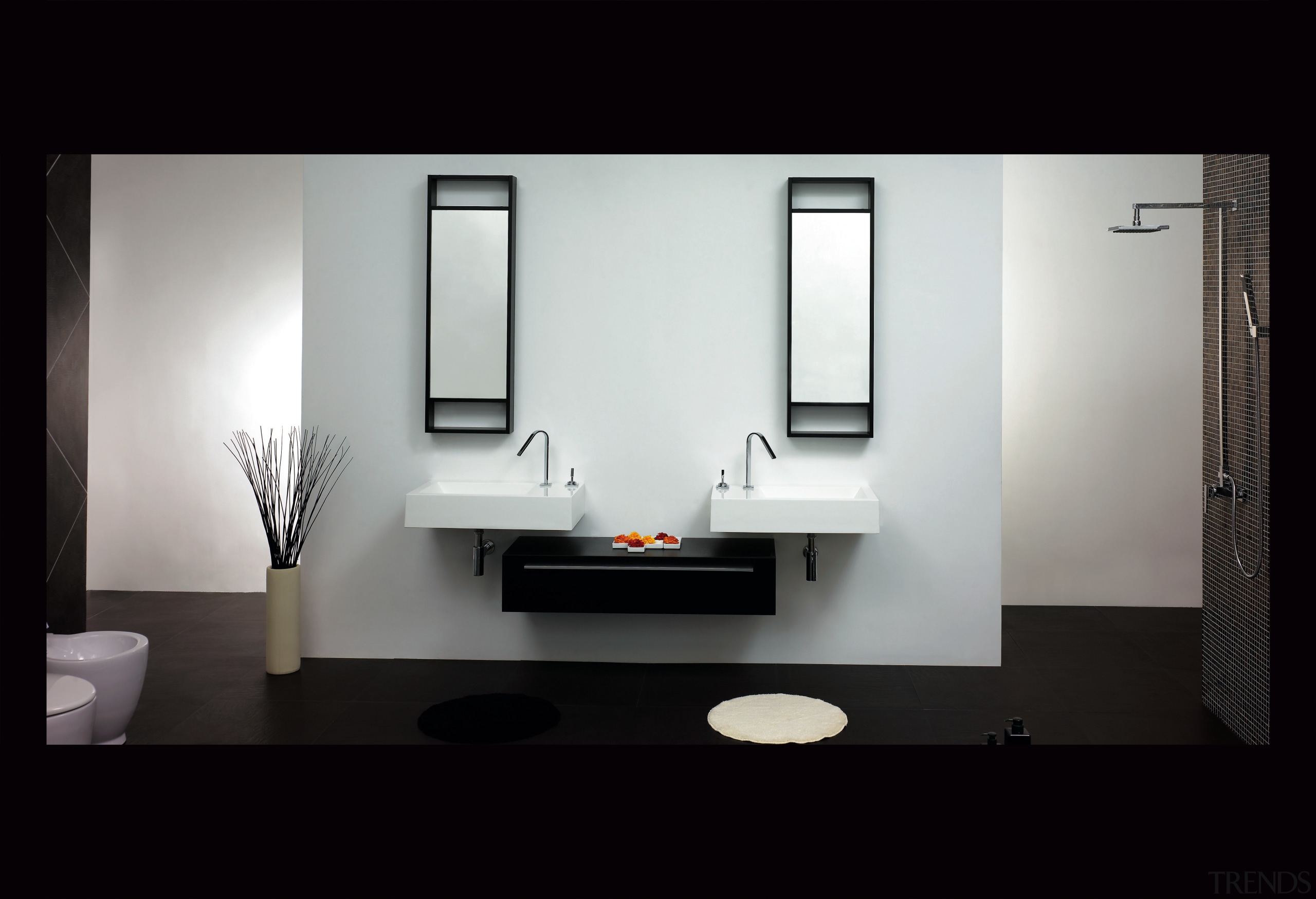 A view of a bthroom vanity by Tonusa. bathroom, bathroom accessory, product design, black, gray