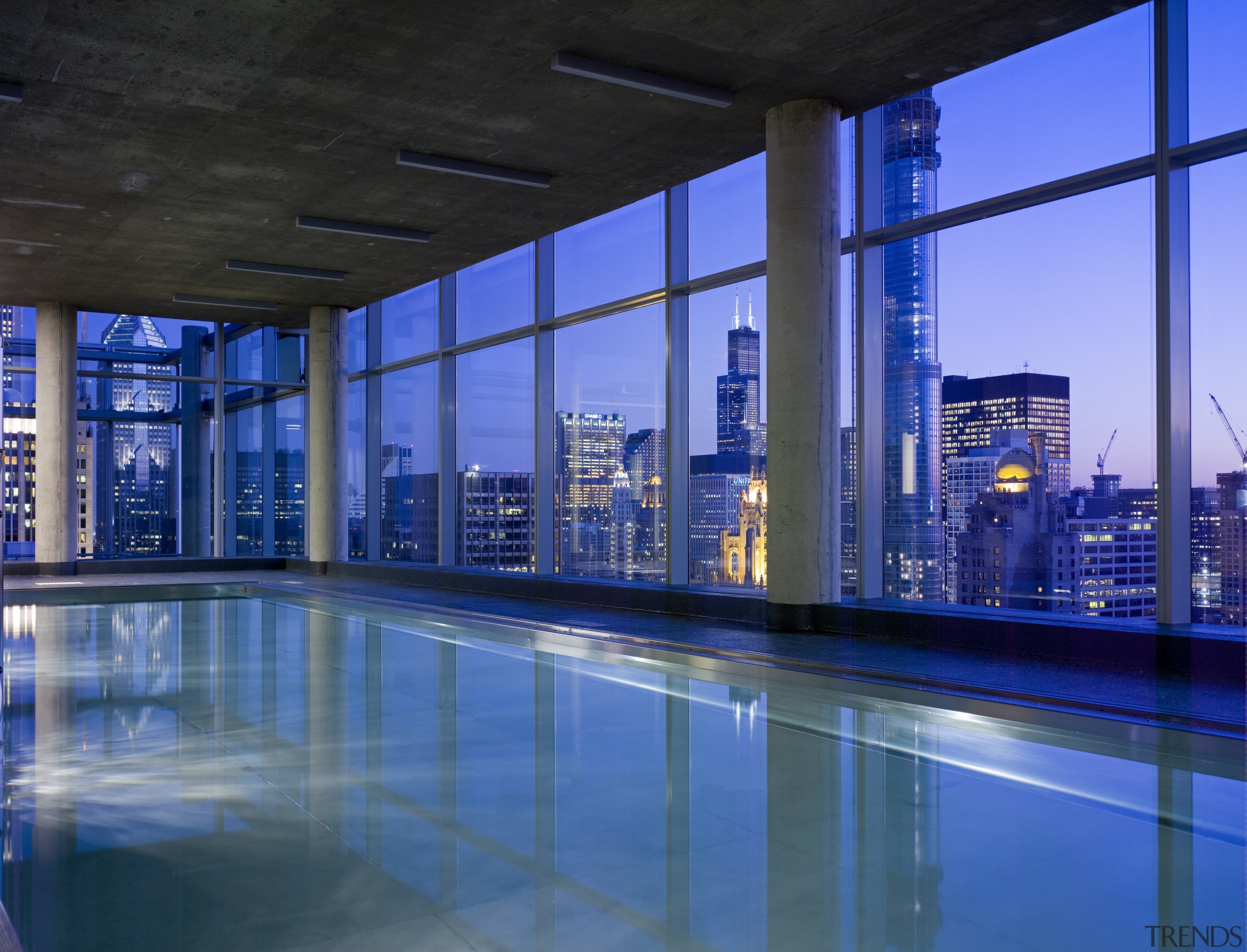View of the swimming pool in the 600 architecture, blue, condominium, daylighting, leisure centre, lighting, metropolitan area, real estate, reflection, sky, swimming pool, water, blue