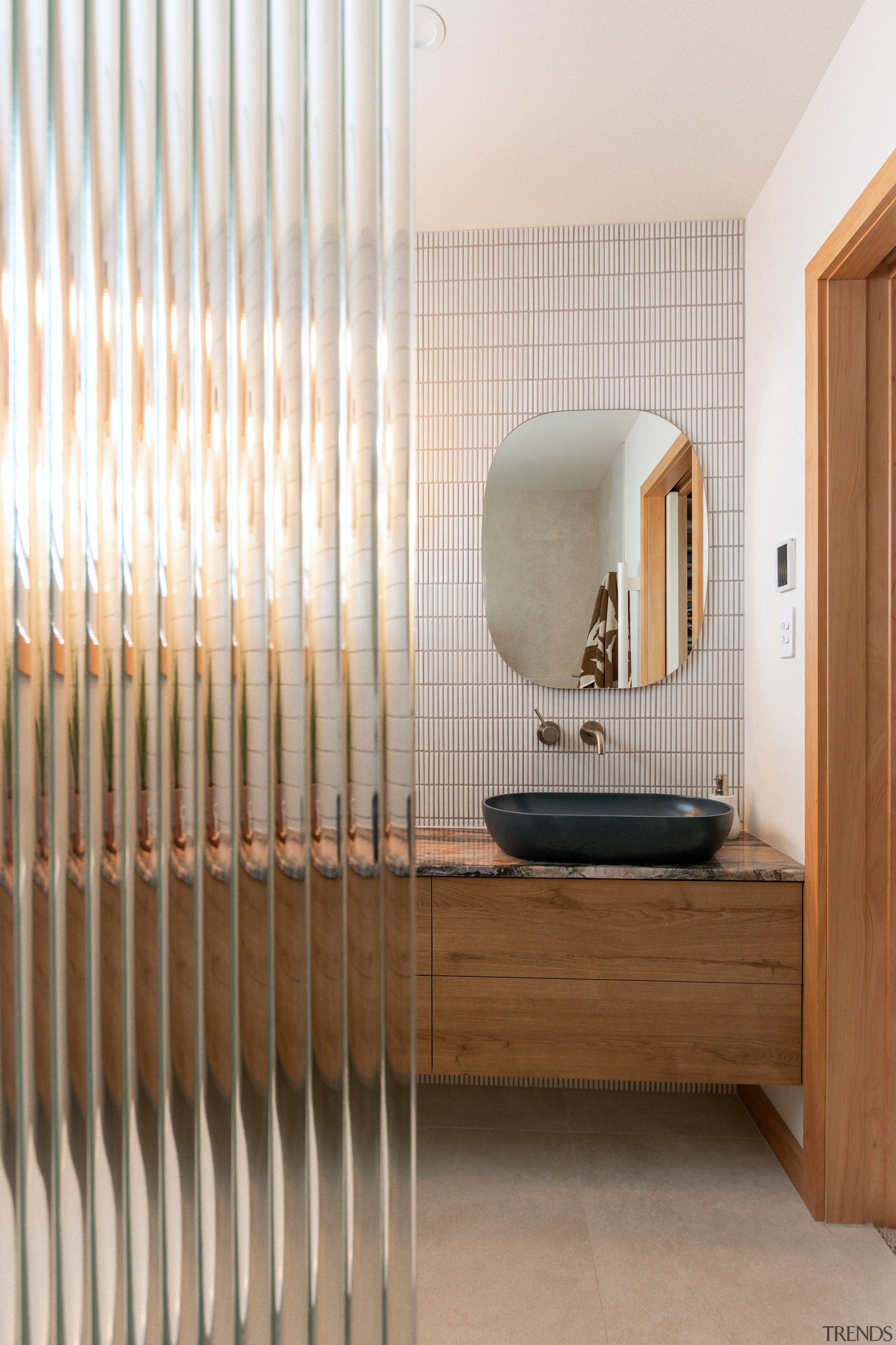 The reeded glass shower screen was used to 