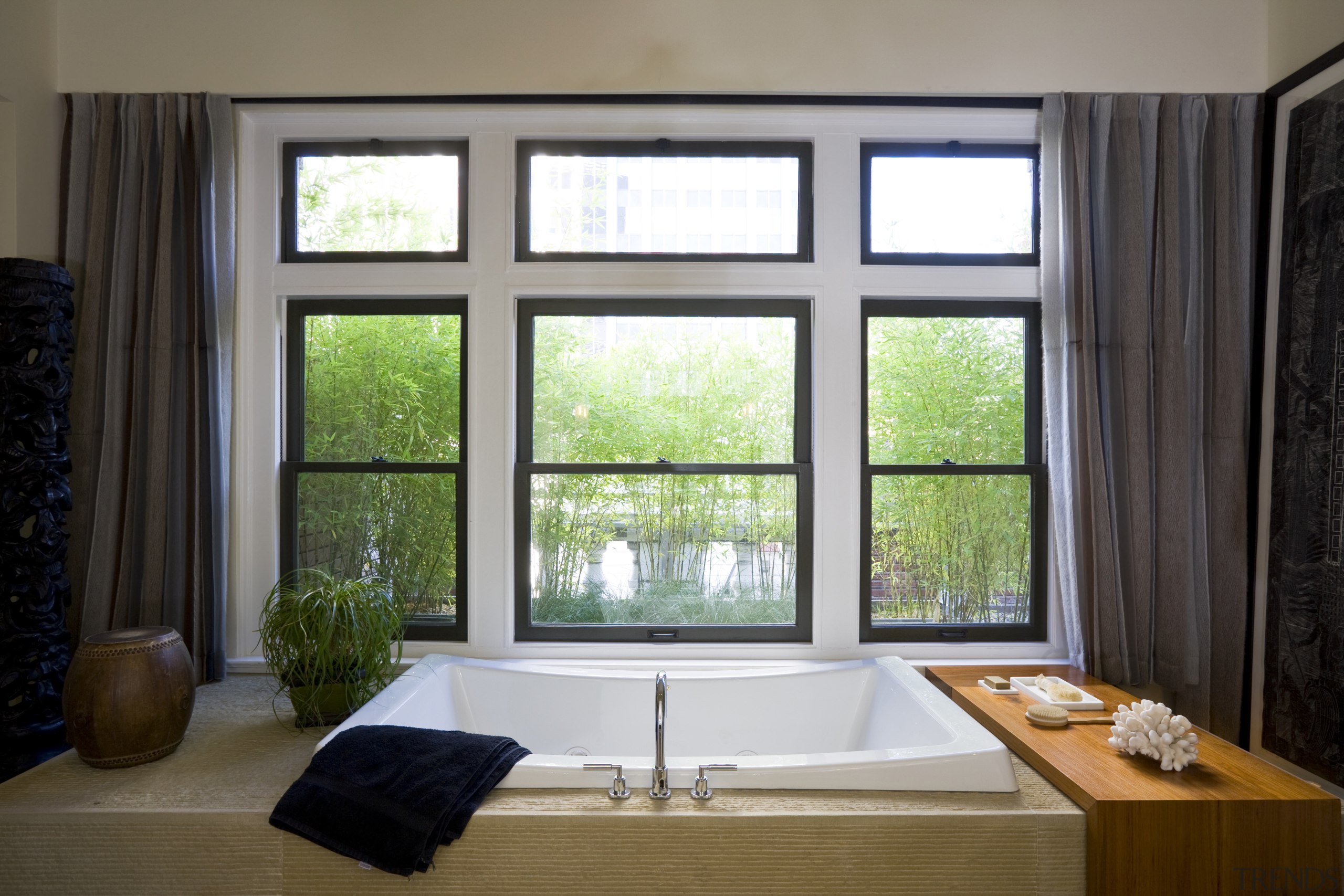 View of bathtub which is set into a curtain, daylighting, home, house, interior design, real estate, room, sash window, window, window covering, window treatment, wood, black