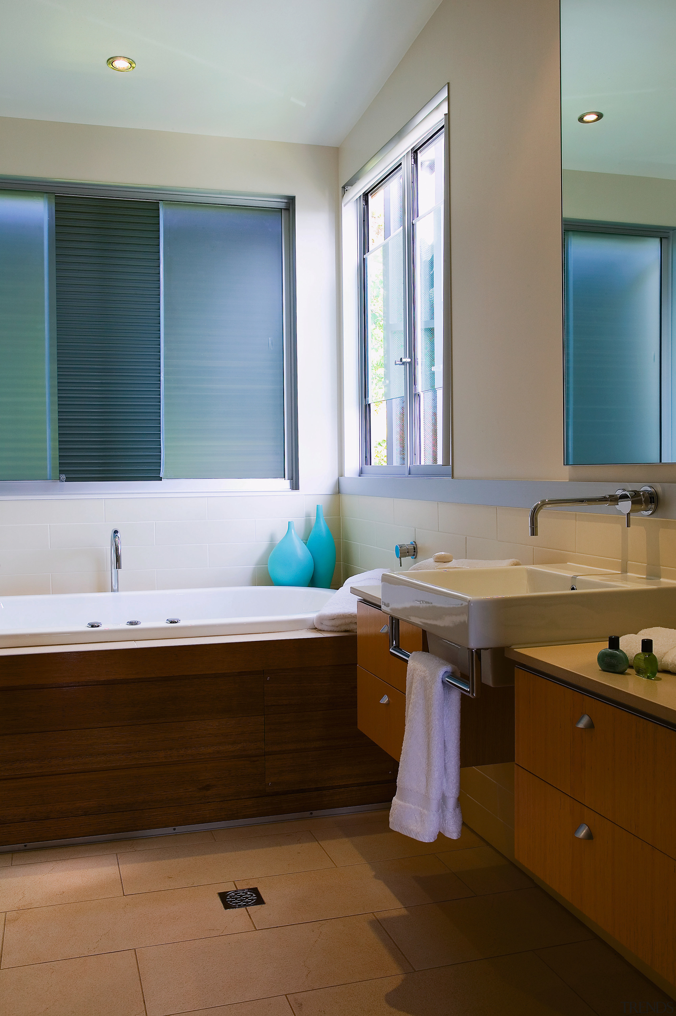 view of the bathroom featuring timber veneer vanity, bathroom, floor, home, interior design, room, sink, window, brown, gray