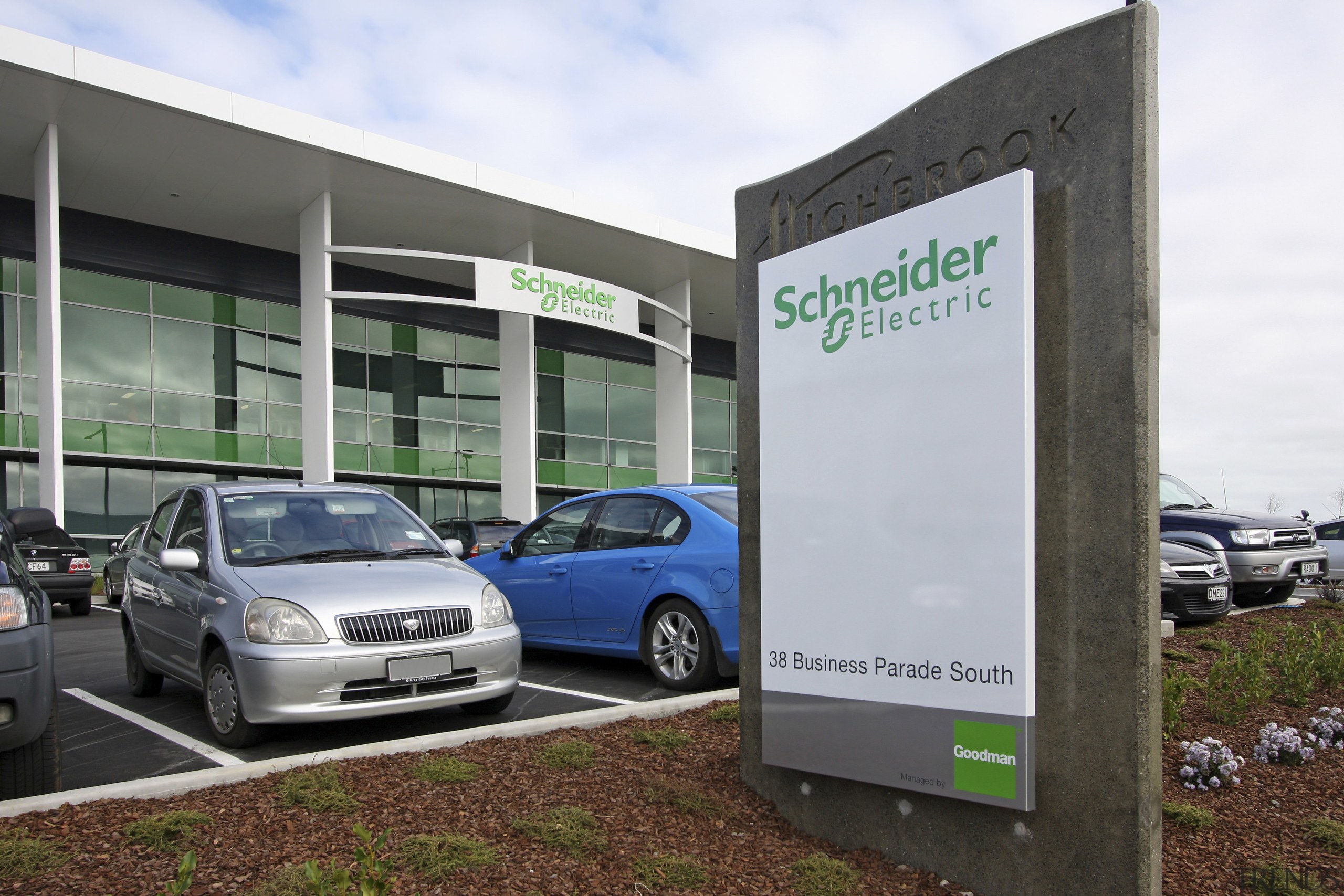 Exterior view of the Schneider Electrical head office advertising, automotive design, building, car, family car, luxury vehicle, motor vehicle, technology, vehicle, white