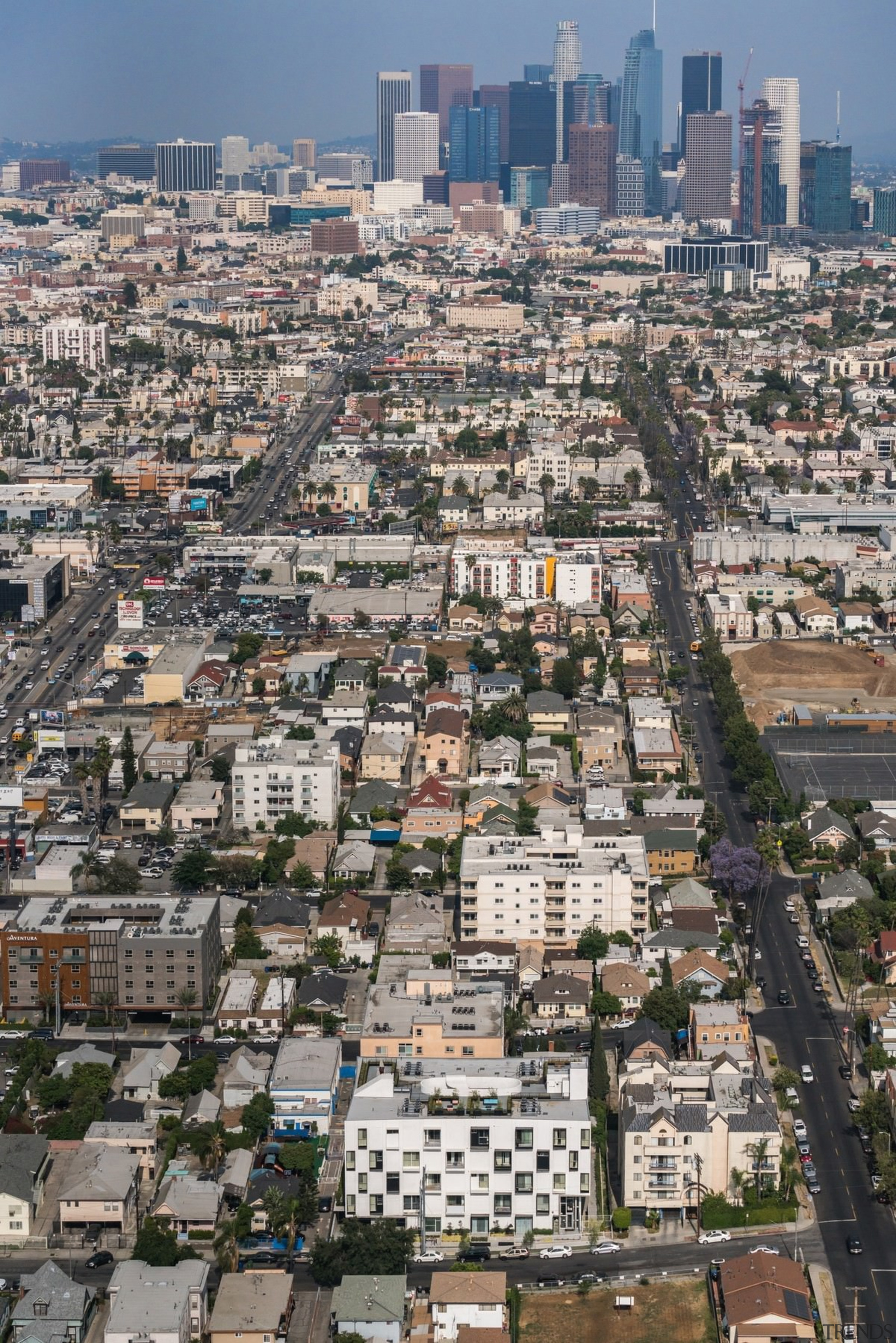 The building within the wider city - The aerial photography, bird's eye view, building, city, cityscape, daytime, downtown, metropolis, metropolitan area, neighbourhood, residential area, skyline, skyscraper, suburb, tower block, urban area, gray