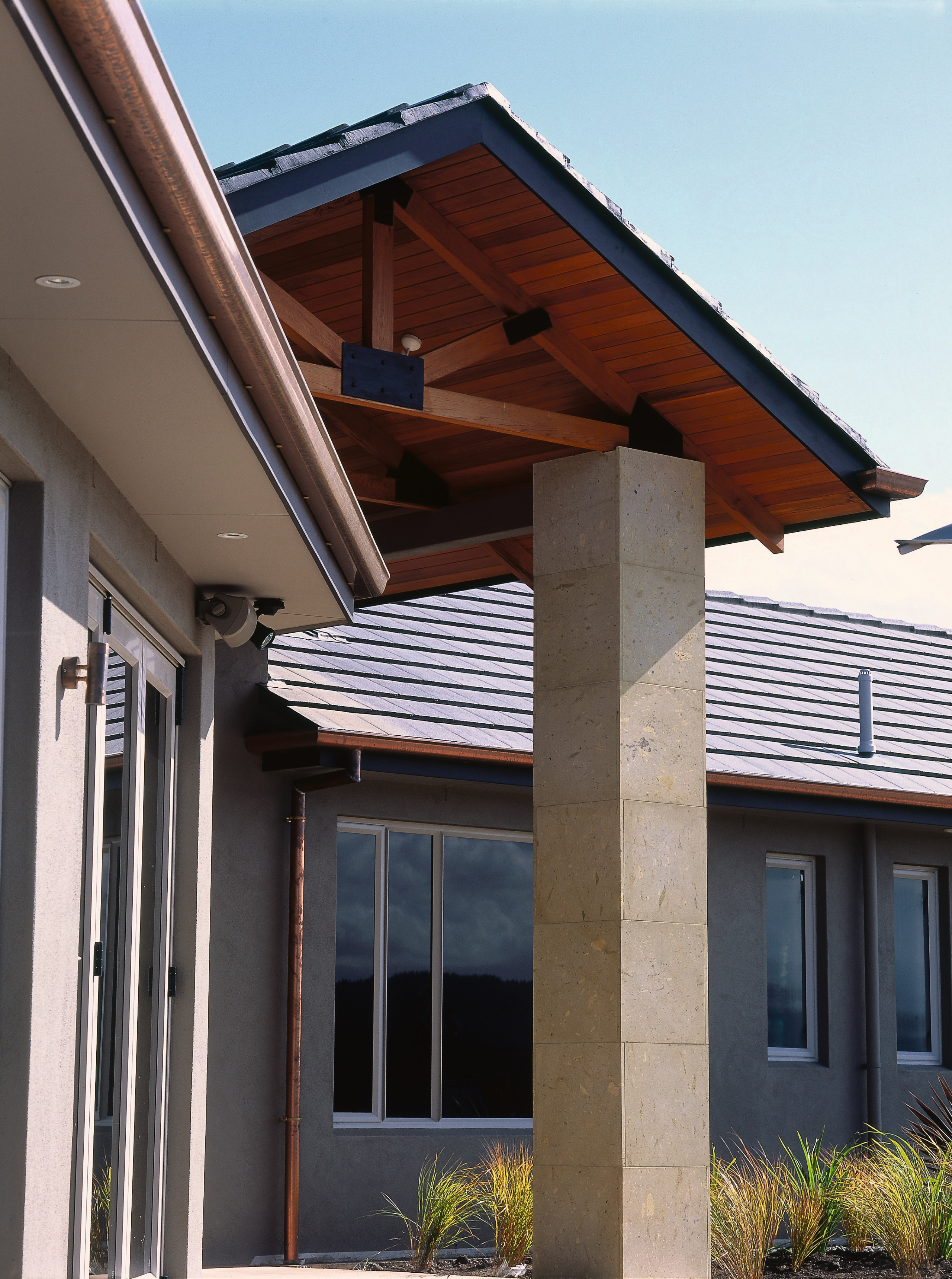 A view of a home constructed by Advantage daylighting, facade, home, house, porch, real estate, residential area, roof, siding, structure, window, white, black