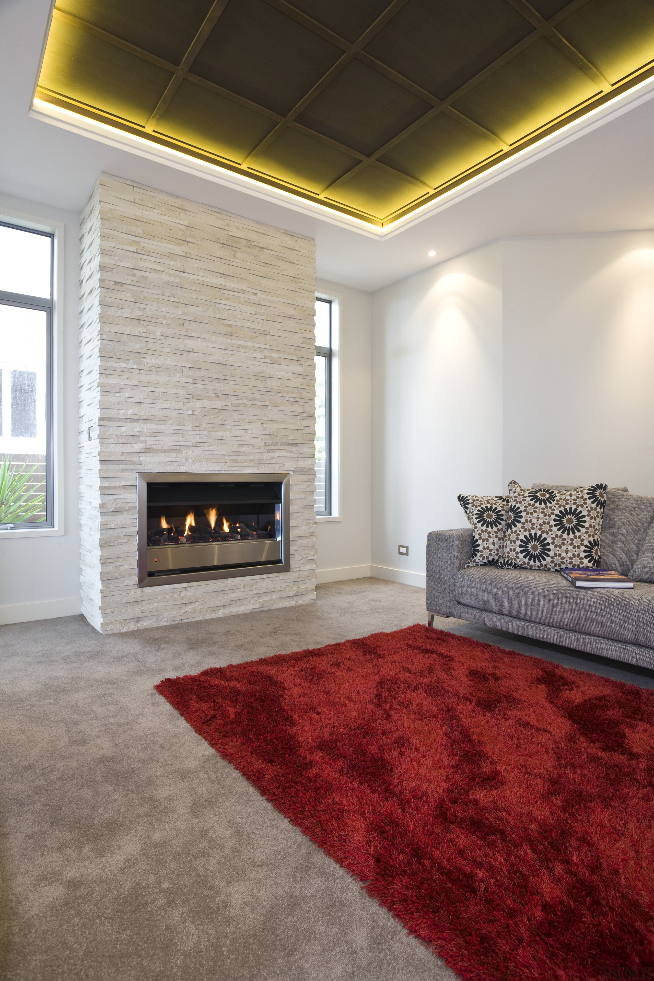 View of a living area at the Harbourcity carpet, ceiling, fireplace, floor, flooring, hardwood, hearth, home, house, interior design, laminate flooring, living room, real estate, room, tile, wall, wood, wood flooring, gray