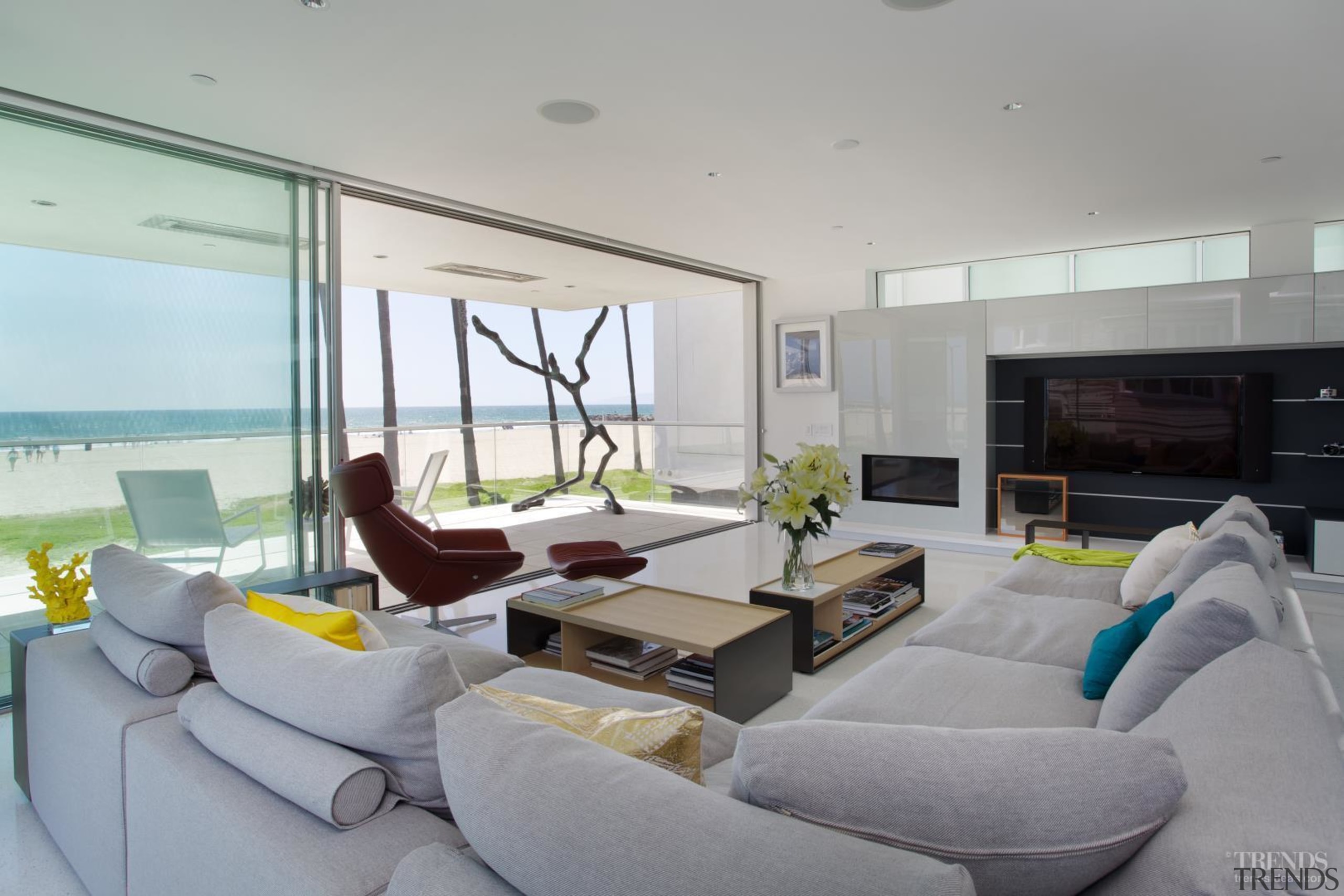 The light-filled living room in this contemporary beachfront architecture, house, interior design, living room, penthouse apartment, property, real estate, window, gray