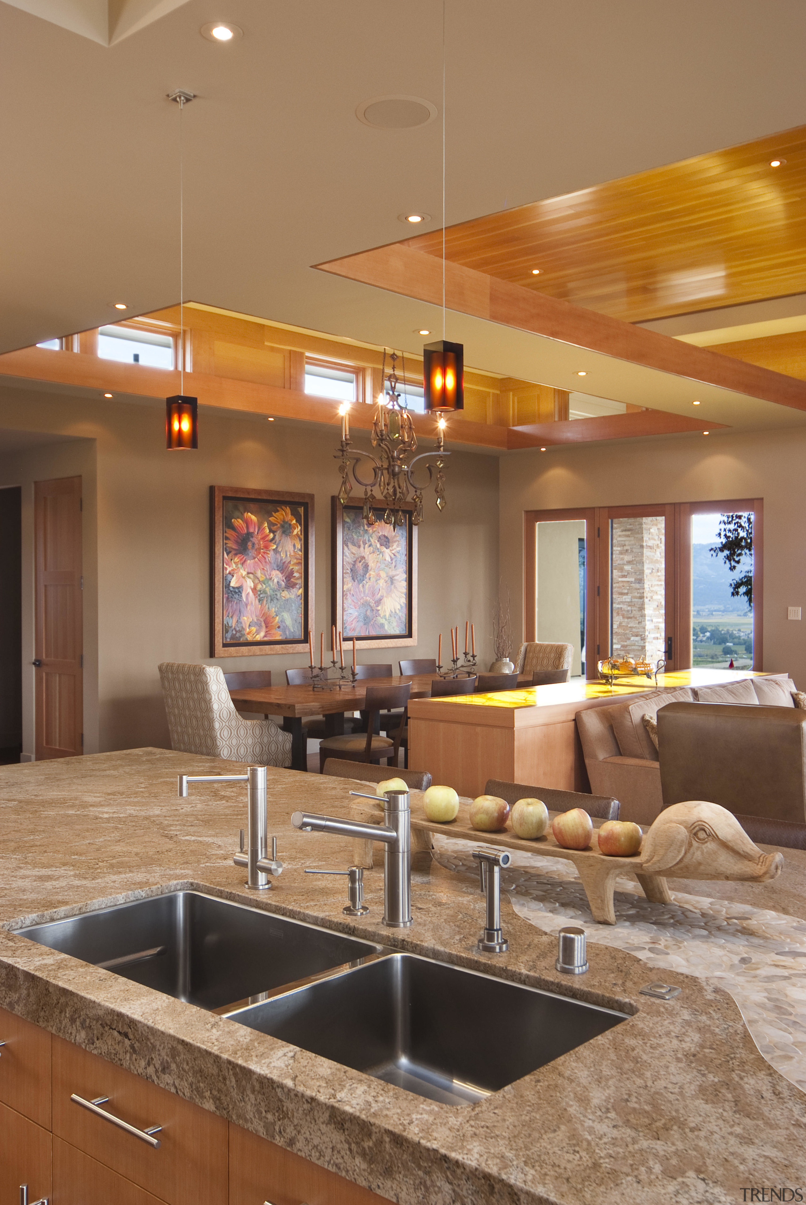 View of kitchen with wooden flooring, stone wall ceiling, countertop, home, interior design, kitchen, lighting, living room, real estate, orange, brown