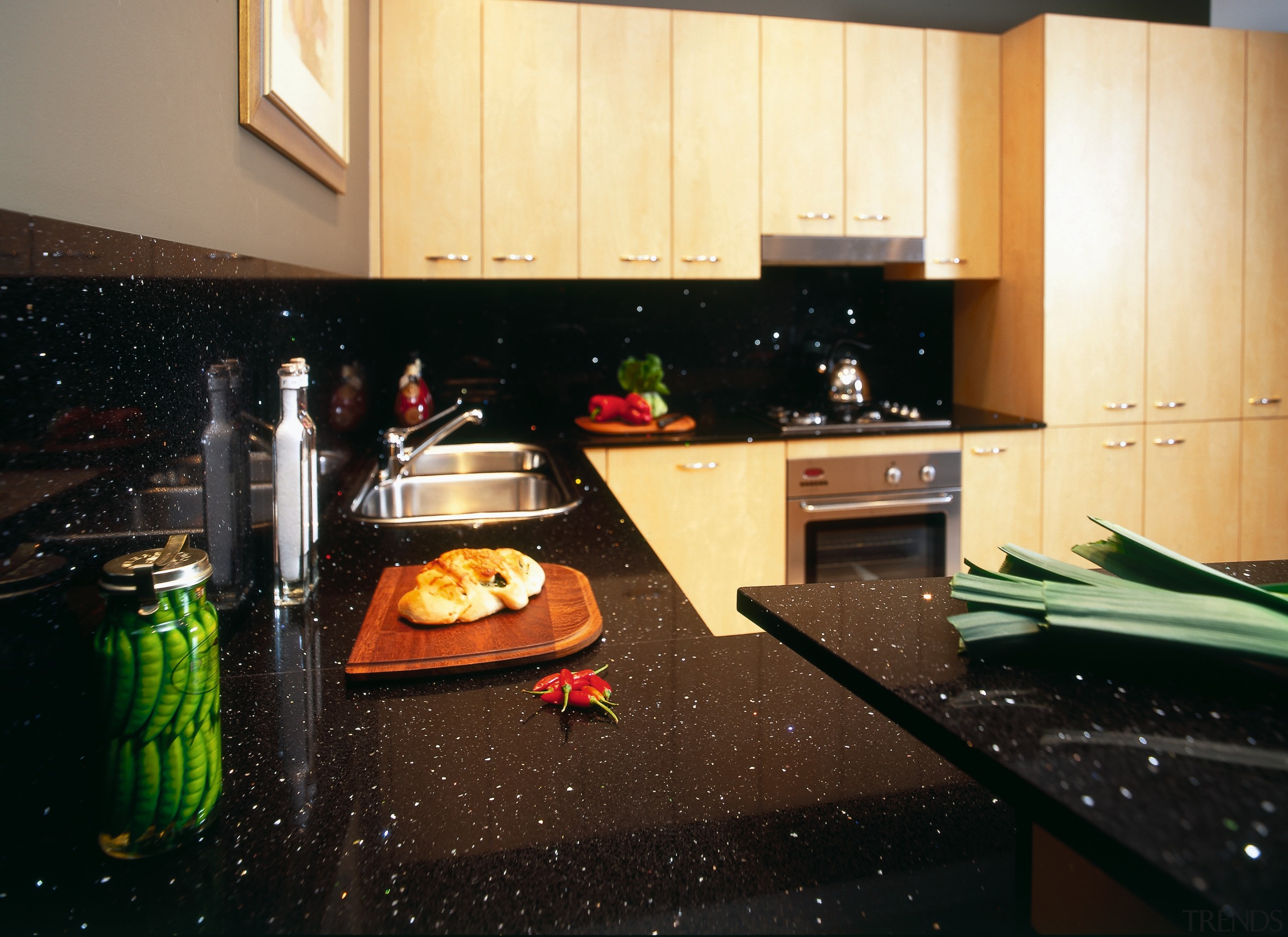 Kitchen with black granite benchtop and light veneer countertop, flooring, interior design, kitchen, room, under cabinet lighting, black