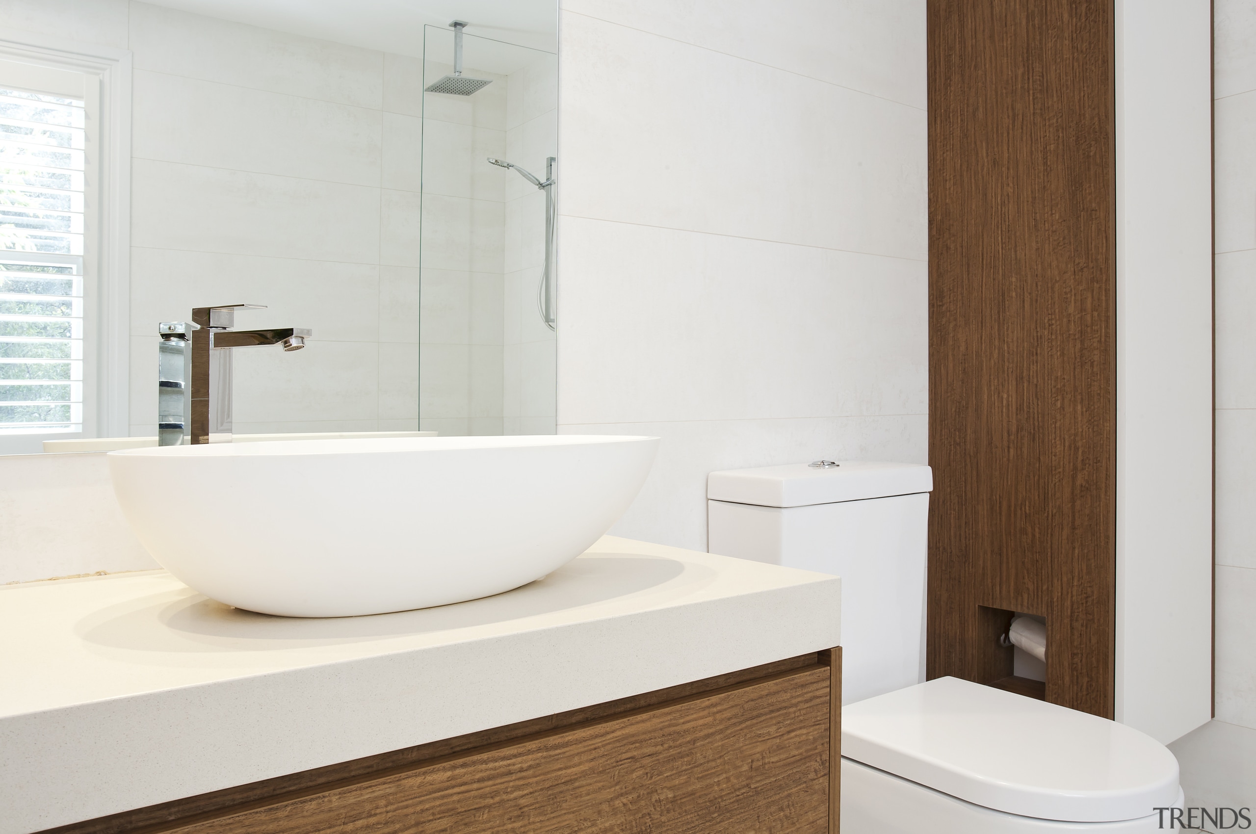 In this bathroom by designer Anna Klimova, recessed bathroom, bathroom accessory, bathroom cabinet, bathroom sink, bidet, ceramic, floor, interior design, plumbing fixture, product design, room, sink, tap, toilet seat, white