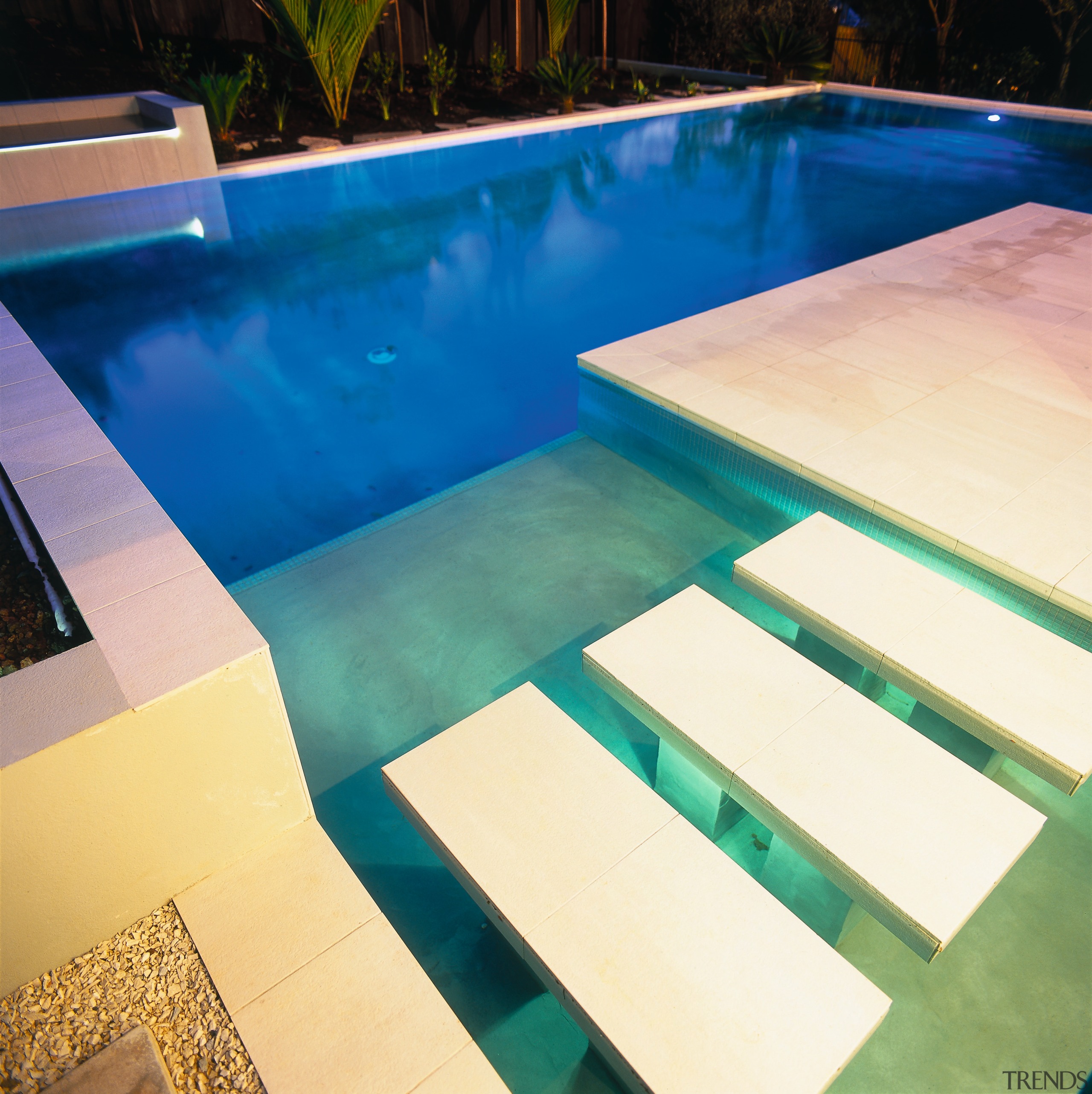 Closeup of pool with paving and stepping  daylighting, floor, flooring, swimming pool, table, wood, orange