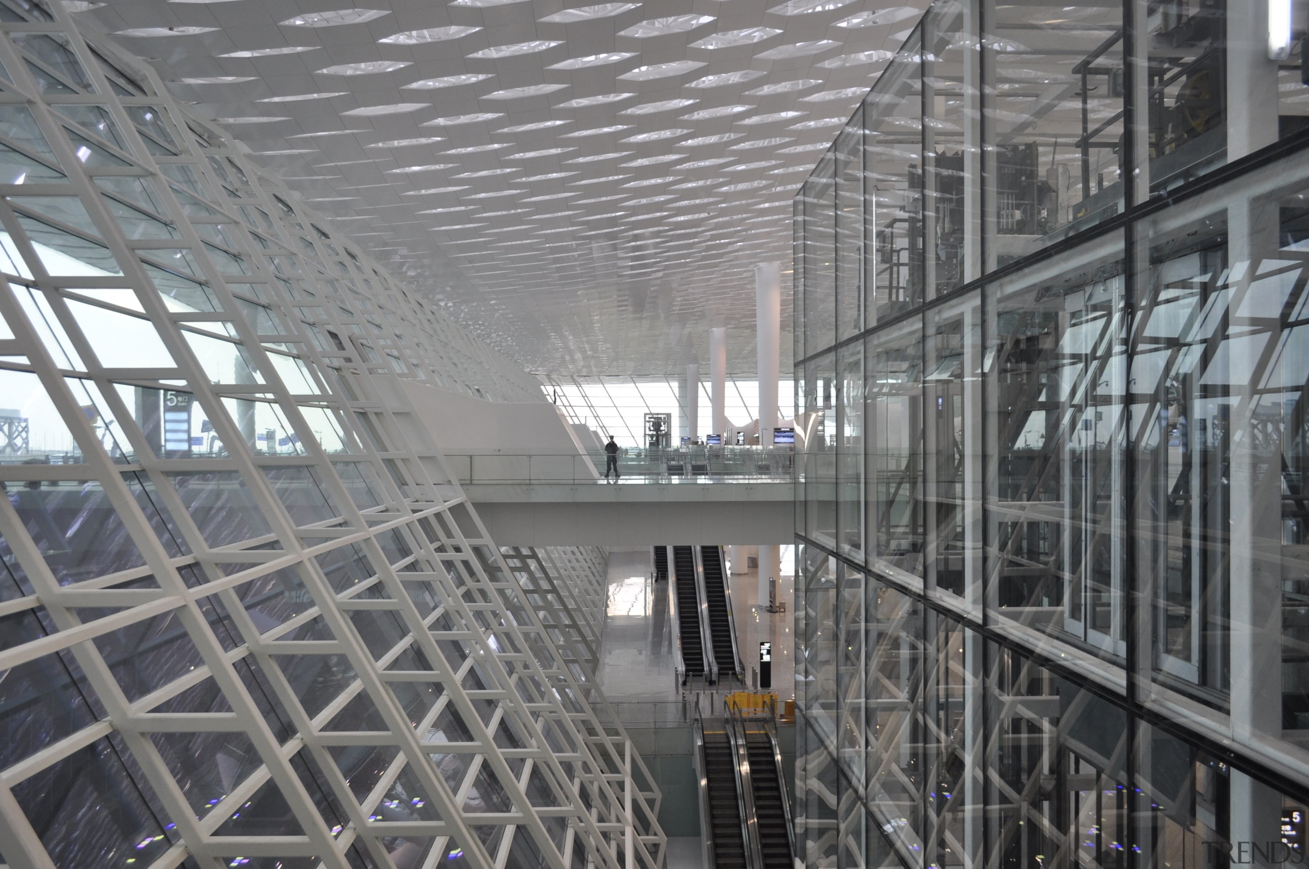 Looking much like a giant sculpture from both airport terminal, architecture, building, daylighting, metropolis, metropolitan area, steel, structure, tourist attraction, gray