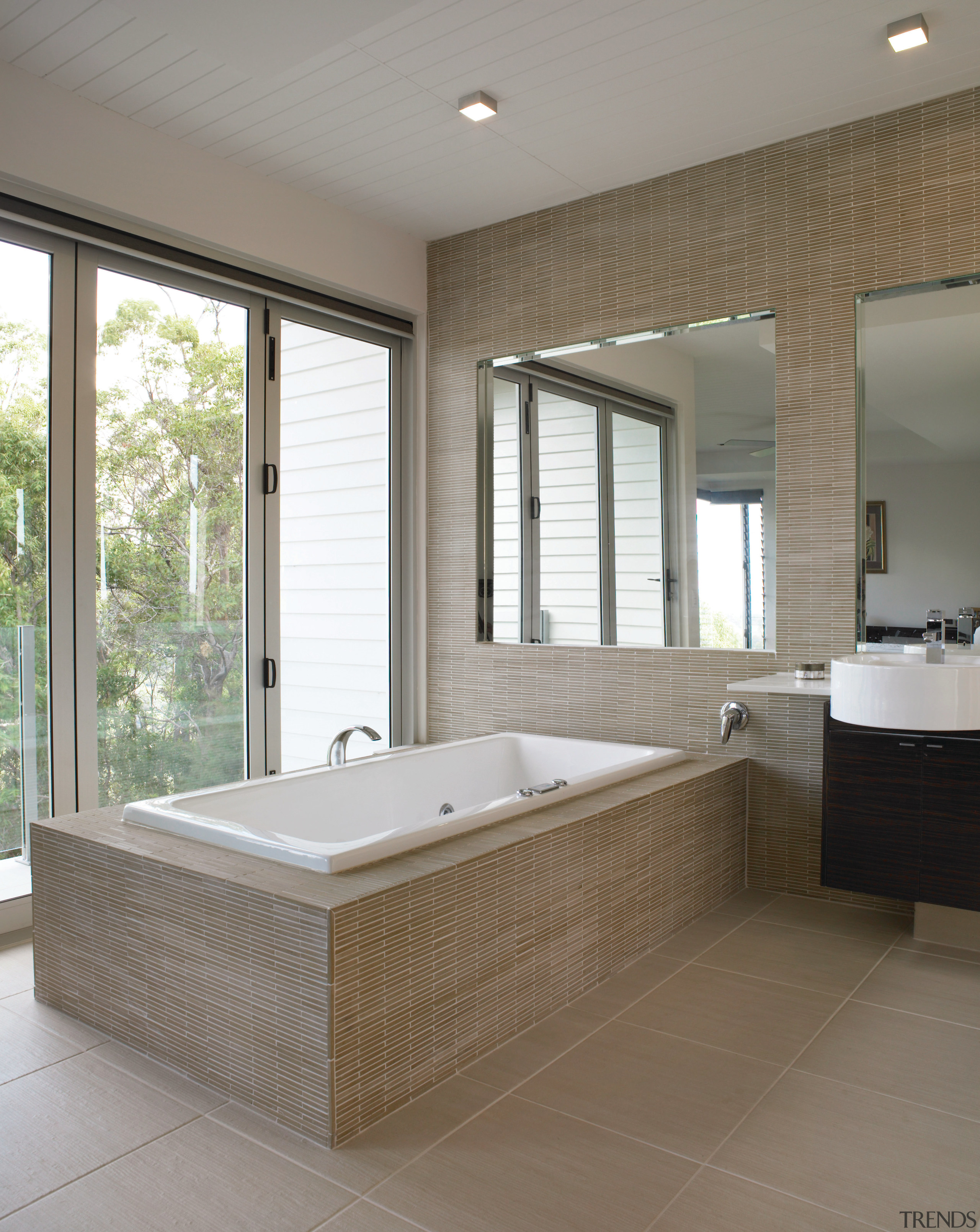 View of an ensuite that features Scyon Secura bathroom, bathtub, estate, floor, flooring, home, interior design, real estate, room, tile, wall, window, gray