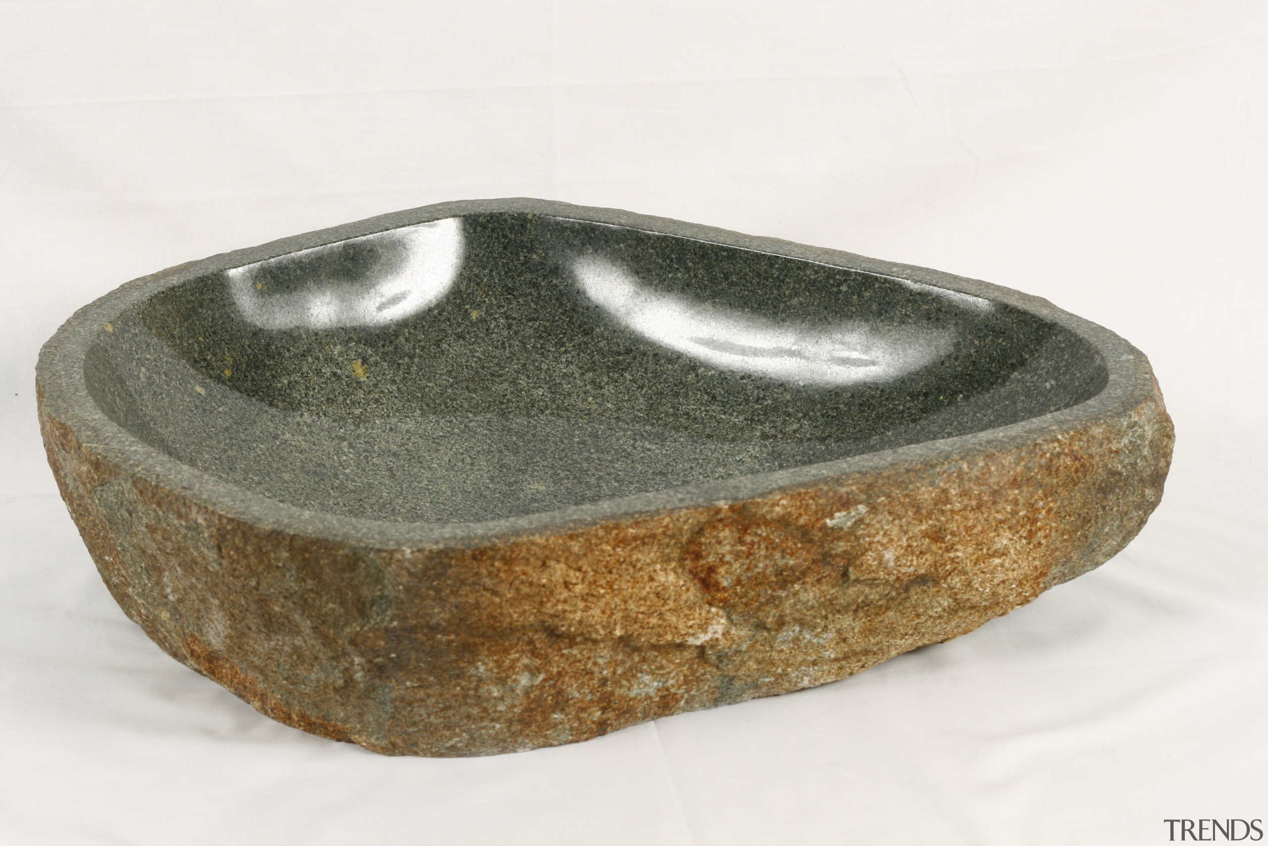 View of custom-designed stone vessel sinks crafted from white